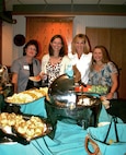 MINOT AIR FORCE BASE, N.D. -- Members of the Minot Officers' Spouses' Club partook in a meet and greet social at the Jimmy Doolittle Center recently, to encourage new membership and provide new spouses with a networking opportunity. New boosts in club membership allows the organization to further extend the services they offer to base personnel and the Minot community. (Courtesy photo)