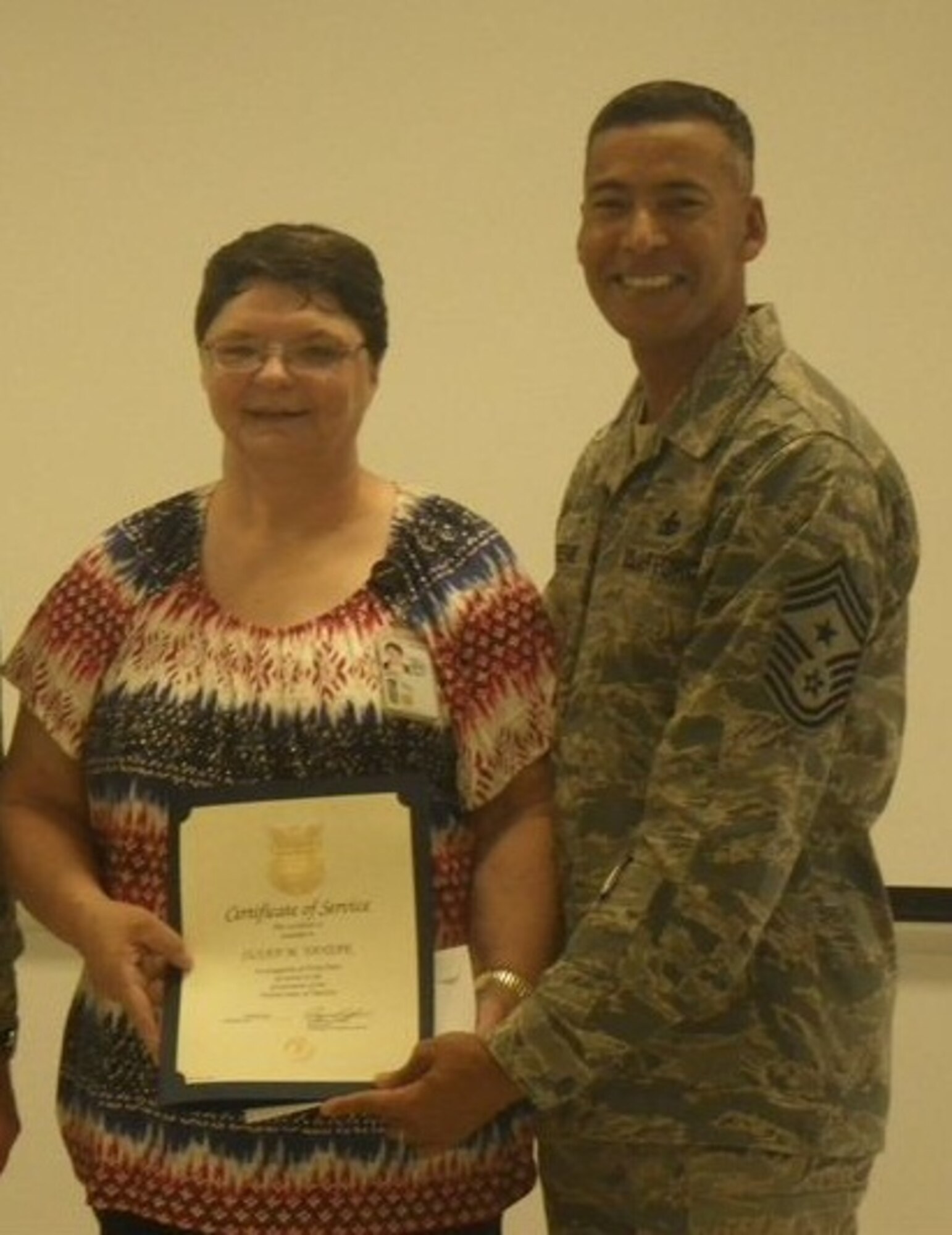 Susan Yansak, 87th Security Forces Squadron office automation clerk, earned recognition Sept. 4 for her 40 years of service to the U.S. military.
Susan began her career with the Army in 1972 and worked in various positions with the Army’s Noncommissioned Officers Academy, Walson Army Hospital central appointment desk and adjutant general section, and the U.S. Army Overseas Replacement Center.
Her administrative career began in August 1979 working as a clerk typist for four years and as an operations clerk for nine and a half years in the 5th Training Brigade on what was formerly Fort Dix. 
Susan transferred to the U.S. Army Provost Marshal Office as a military police desk clerk in October 1992 where she worked for seven and a half years. She then began work as an office automation clerk with the Directorate of Public Safety Police Department in October 2000. She was acquired by the 87th SFS when Joint Base McGuire-Dix-Lakehurst stood up in October 2009 and has been working with the 87th SFS since.
