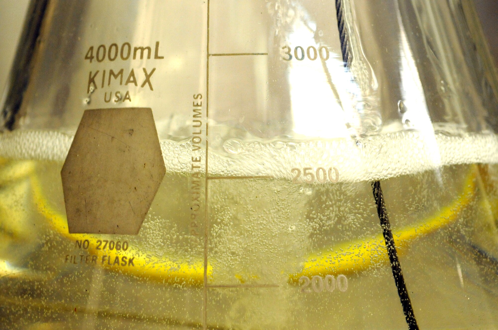 Aviation fuel is filtered for testing at the 8th Logistics Readiness Squadron fuels lab at Kunsan Air Base, Republic of Korea, Sept. 4, 2012. Contaminants and water are some of the things fuels technicians test the fuel for before issuing it out. (U.S. Air Force photo/Senior Airman Brigitte N. Brantley)