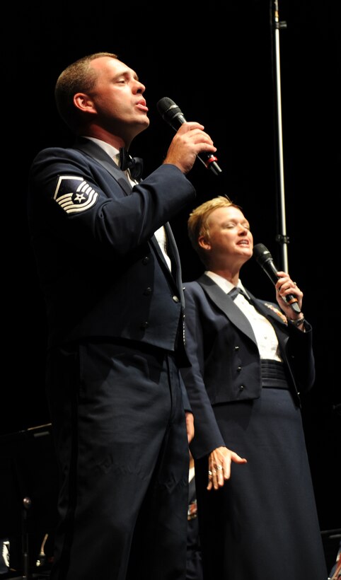 Master Sgt. Eric Sullivan and Senior Master Sgt. Angela Burns of the Singing Sergeants, perform a duet at The U.S. Air Force Concert Band and Singing Sergeants concert at the Bowie Center for the Performing Arts on Aug. 29, 2012, in Bowie, Md. (U.S. Air Force photo/Staff Sgt. Torey Griffith)
