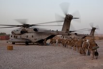 U.S. Marines with 1st Battalion, 7th Marine Regiment, Regimental Combat Team 6 load on to CH-53E Super Stallion helicopters on Forward Operating Base Jackson, Helmand province, Afghanistan Aug. 30, 2012. This flight is the first leg in their journey home as they reach the end of their deployment.