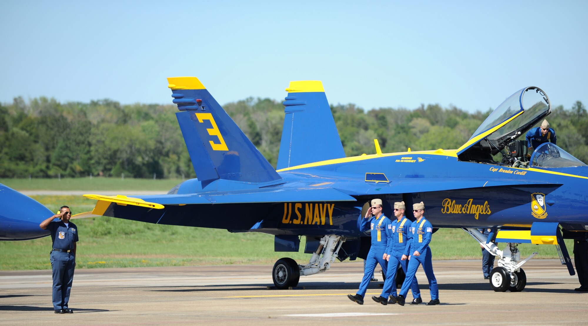 U.S. Navy Blue Angels pilots walk to their aircraft Sept. 8, 2012, Little Rock Air Force Base, Ark.  The Blue Angels performed during the 2012 Heritage and Heroes Open House and Air Show. (U.S. Air Force photo by Staff Sgt. Caleb Pierce) 