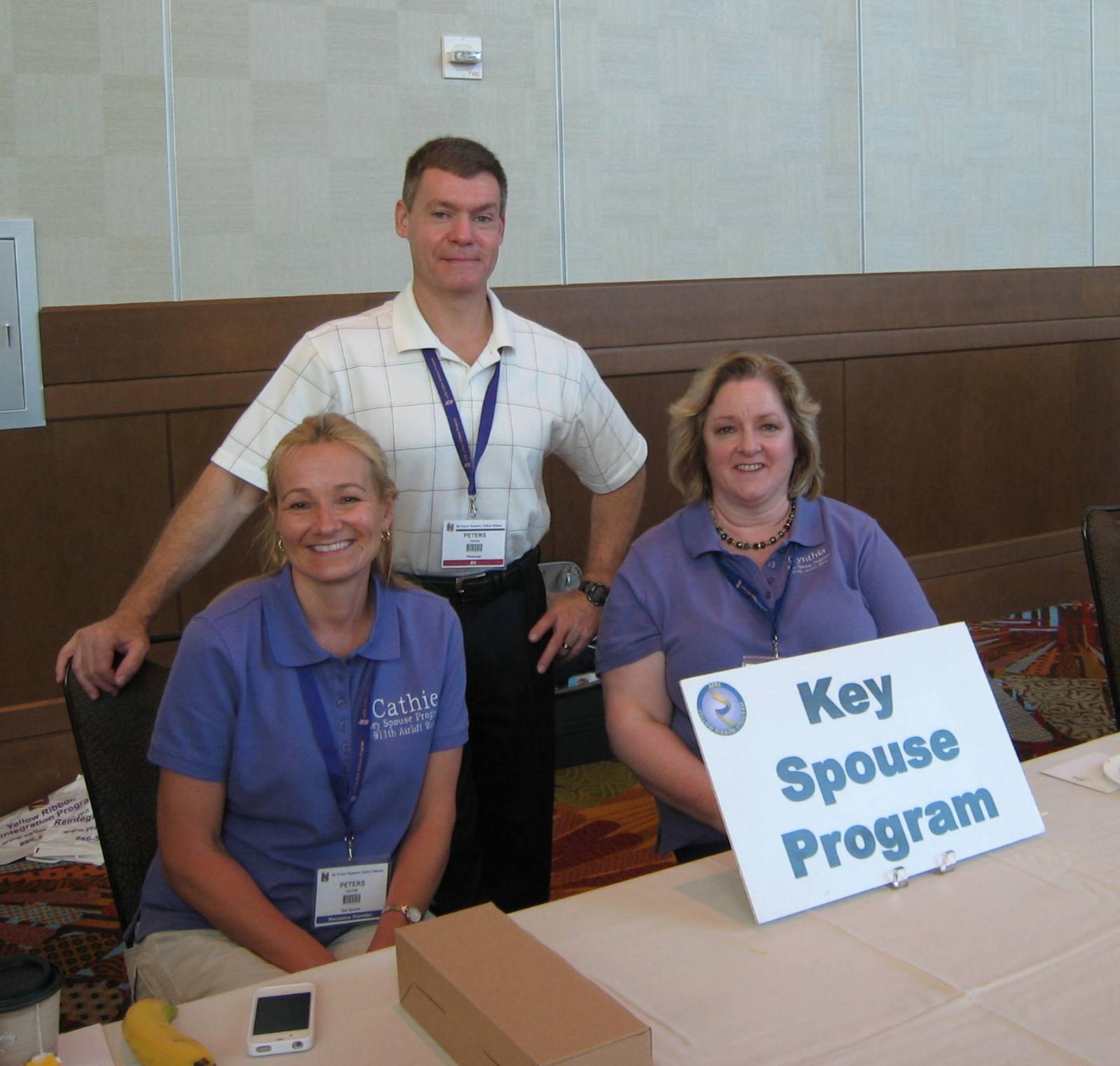 Cathie Peters (left), 911th Airlift Wing Key Spouse Program facilitator is joined by her husband Col. Craig Peters, 911th Airlift Wing commander and Cynthia Lum (right), Key Spouse coordinator during a Yellow Ribbon event in Orlando Fla. August 17-19, 2012. The Key Spouse group met with members and their spouses about upcoming deployments and sharing with them the services the group provides, which includes contacting families of deployed members to ensure needs are met, holding events for spouses and their families and providing spouses with information to all resources that are available to them. (Photo courtesy of 911th Airlift Wing Key Spouse Program)
