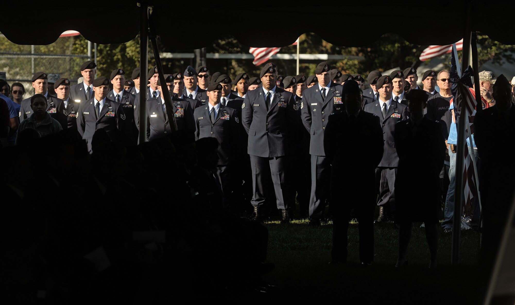 Tactical Air Control Party specialists from the 10th Air Support Operations Squadron, Fort Riley, Kan., stand in formation during a silver star medal presentation for Senior Airman Bradley Smith Sept. 8, 2012 in his hometown of Troy, Ill. Smith was killed in action while serving as a TACP in Afghanistan Jan. 3, 2010. Members of the 10th ASOS spent a week ruck marching his medal 370 miles from Kansas to Troy for the ceremony. Also joining the formation were TACPs from the 168th and 169th ASOS Guard units from Peoria,Ill.  (U.S. Air Force photo/ Staff Sgt. Ryan Crane)