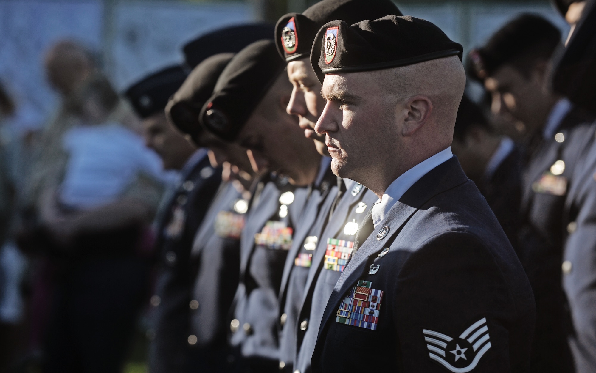 Tactical Air Control Party specialists from the 10th Air Support Operations Squadron, Ft. Riley Kan., stand in formation during a Silver Star medal presentation for Senior Airman Bradley Smith Sept. 8, 2012 in his hometown of Troy, Ill. Smith was killed in action while serving as a TACP in Afghanistan Jan. 3, 2010. Members of the 10th ASOS spent a week ruck marching his medal 370 miles from Kansas to Troy for the ceremony. (U.S. Air Force photo/ Staff Sgt. Ryan Crane)