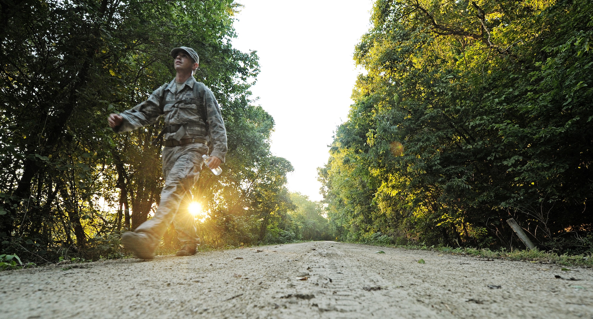 Airman 1st Class Nicholas Jewitt, Tactical Air Control Party specialist from the 10th Air Support Operations Squadron, Fort Riley, Kan., carries a ruck sack along a 370 mile march near St. Louis, Mo. Sept. 6, 2012. The ruck sack contains the Silver Star medal being posthumously awarded to Senior Airman Bradley Smith for his actions while serving in Afghanistan. His unit spent a week marching his medal from Kansas to Troy, Ill., for the ceremony. (U.S. Air Force photo/ Staff Sgt. Ryan Crane)
