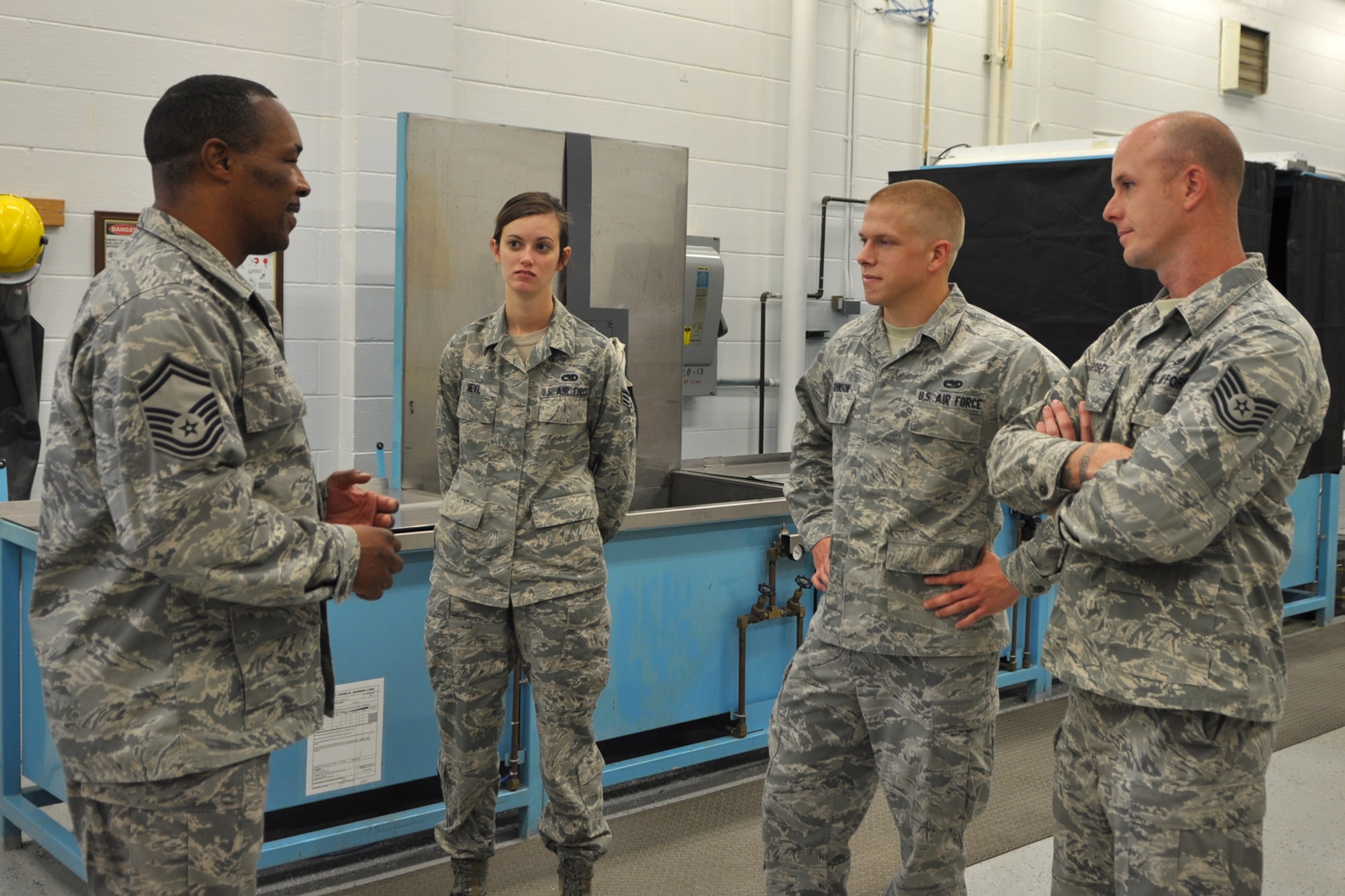 Senior Master Sgt. David Fogg, (B-52) armament systems flight chief, 307th Maintenance Squadron, Barksdale Air Force Base, La., discusses plans for the day with a group of Barksdale Airmen during a morning briefing at Minot Air Force Base, N.D., Sept. 5, 2012. Fogg was one of 42 Airmen from Barksdale who deployed to Minot in support of NORTHERN BREAK. (U.S. Air Force photo by Master Sgt. Jeff Walston/Released)   