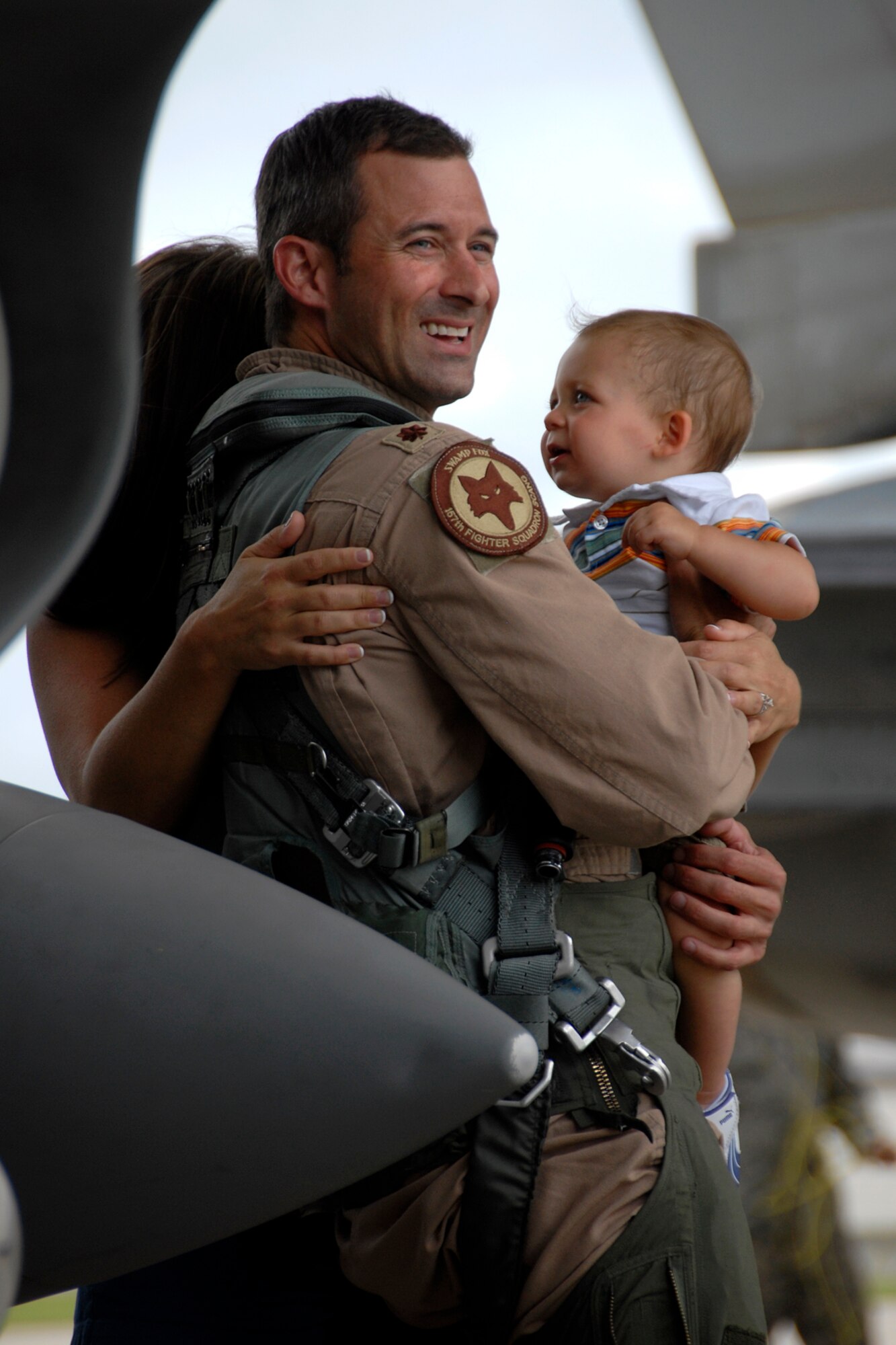 Maj. Jeffrey "Nasty" Beckham, an F-16 Fighting Falcon fighter pilot with the 157th Fighter Squadron at McEntire Joint National Guard Base, S.C., returns home to a hero's welcome after a four-month Air Expeditionary Force deployment at Kandahar Airfield, Afghanistan, Aug. 23, 2012. Swamp Fox F-16's, pilots, and support personnel began their AEF deployment in support of Operation Enduring Freedom in early April to take over flying missions for the air tasking order and provide close air support for troops on the ground in Afghanistan. 