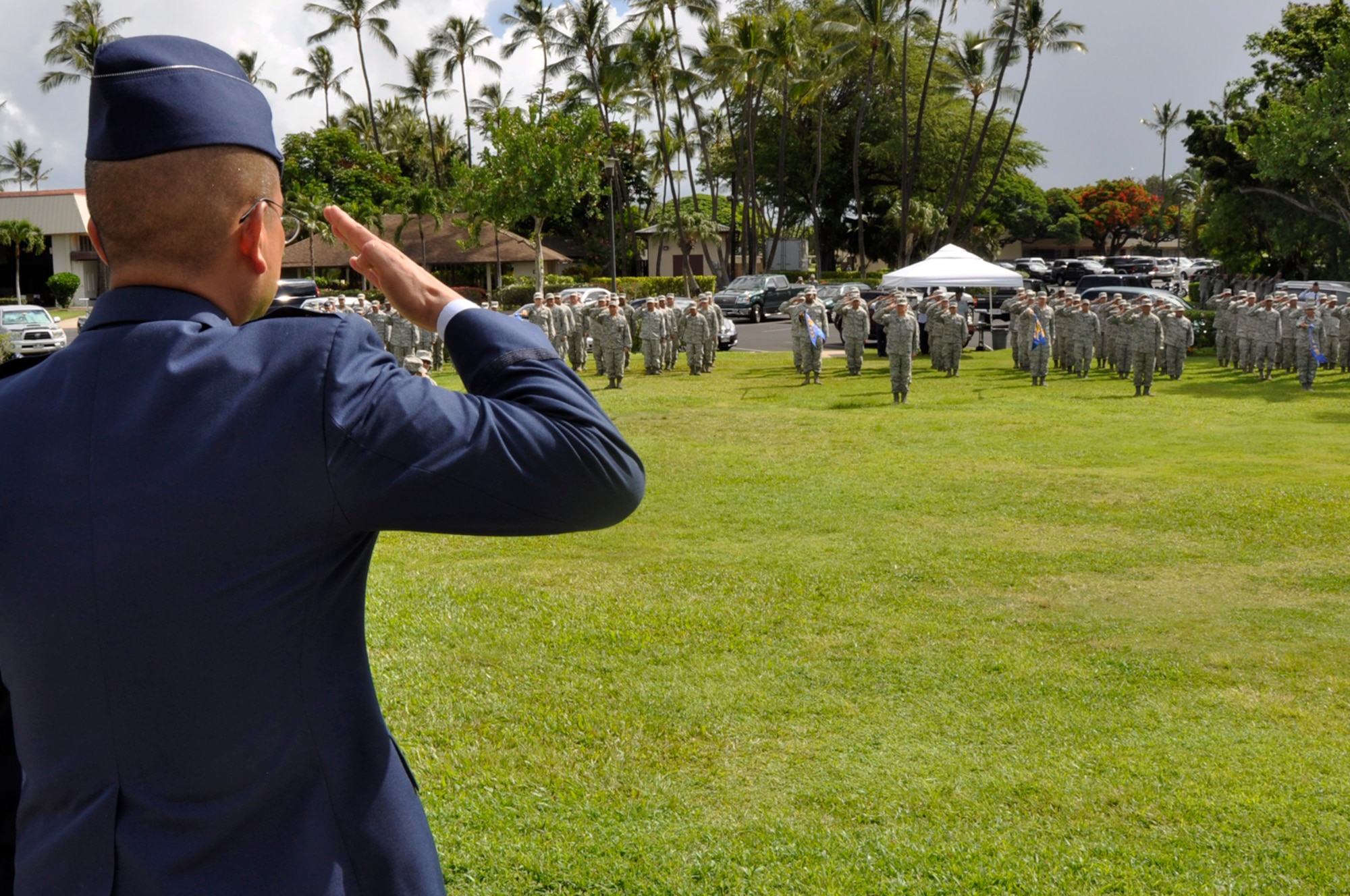 JOINT BASE PEARL HARBOR-HICKAM, Hawaii -- Col. Maynard “Max” Mendoza receives his first salute after assuming command of the 624th Regional Support Group during a ceremony held Sept. 8 at the Missing Man Formation, Aloha Aina Park, here. Colonel Mendoza is now responsible for managing the largest Air Force Reserve presence in the Pacific, which is comprised of six units in Hawaii and Guam. The group provides combatant commanders more than 650 combat-ready Airmen who specialize in aerial port, aeromedical staging, civil engineering and security forces operations for worldwide deployment. (Air Force photo by Master Sgt. Daniel Nathaniel III)