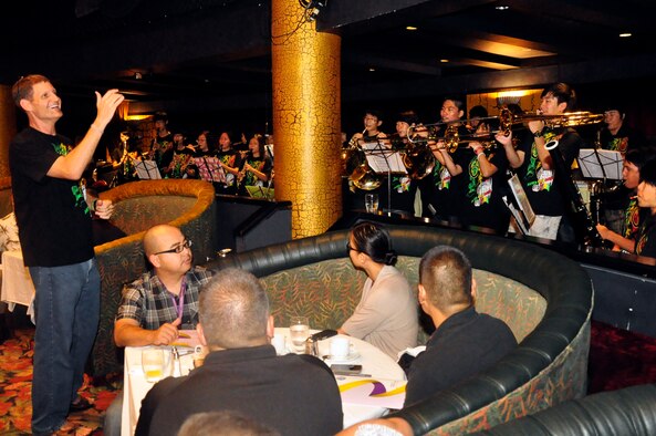 The Saipan Southern High School Manta Ray Band perform for recently deployed members of the 44th Aerial Port Squadron, Joint Base Andersen-Marianas, Guam, and their loved ones at a post-deployment event held Aug. 11-12 in Saipan. The event hosted by the Air Force Reserve Command the 624th Regional Support Group focused on giving the deployers and their families. The Manta Rays volunteered to play at the event after returning from a two-week trip to the 2012 London Olympics where they received a second place at the London Celebration Music Festival.  (Air Force photo by Master Sgt. Daniel Nathaniel III)
