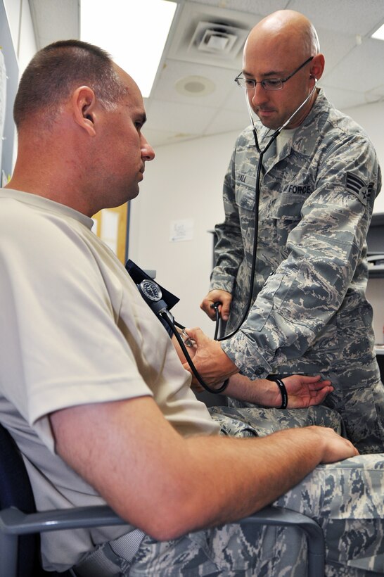 YOUNGSTOWN AIR RESERVE STATION, Ohio – U.S. Air Force Reserve Senior Airman Marvin Hall, an aeromedical technician with the 910th Medical Squadron, takes an Airman’s blood pressure here during a Unit Training Assembly.  Hall, now a staff sergeant, performs basic patient care such as taking vitals, giving immunizations and taking care of medical records. U.S. Air Force photo by Staff Sgt. Valerie Smock