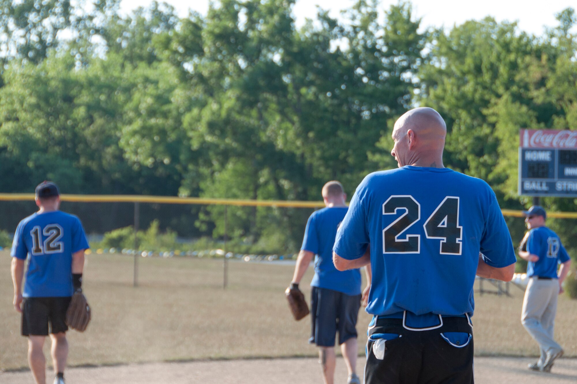 KENT, Ohio -- The 910th Airlift Wing Air Force Falcons softball team 'takes the field' July 10, 2012 during a game here. The Falcons recently won the USO of Northern Ohio's Commander's Cup tournament for the third consecutive year. U.S. Air Force photo by Staff Sgt. Megan Tomkins/Released