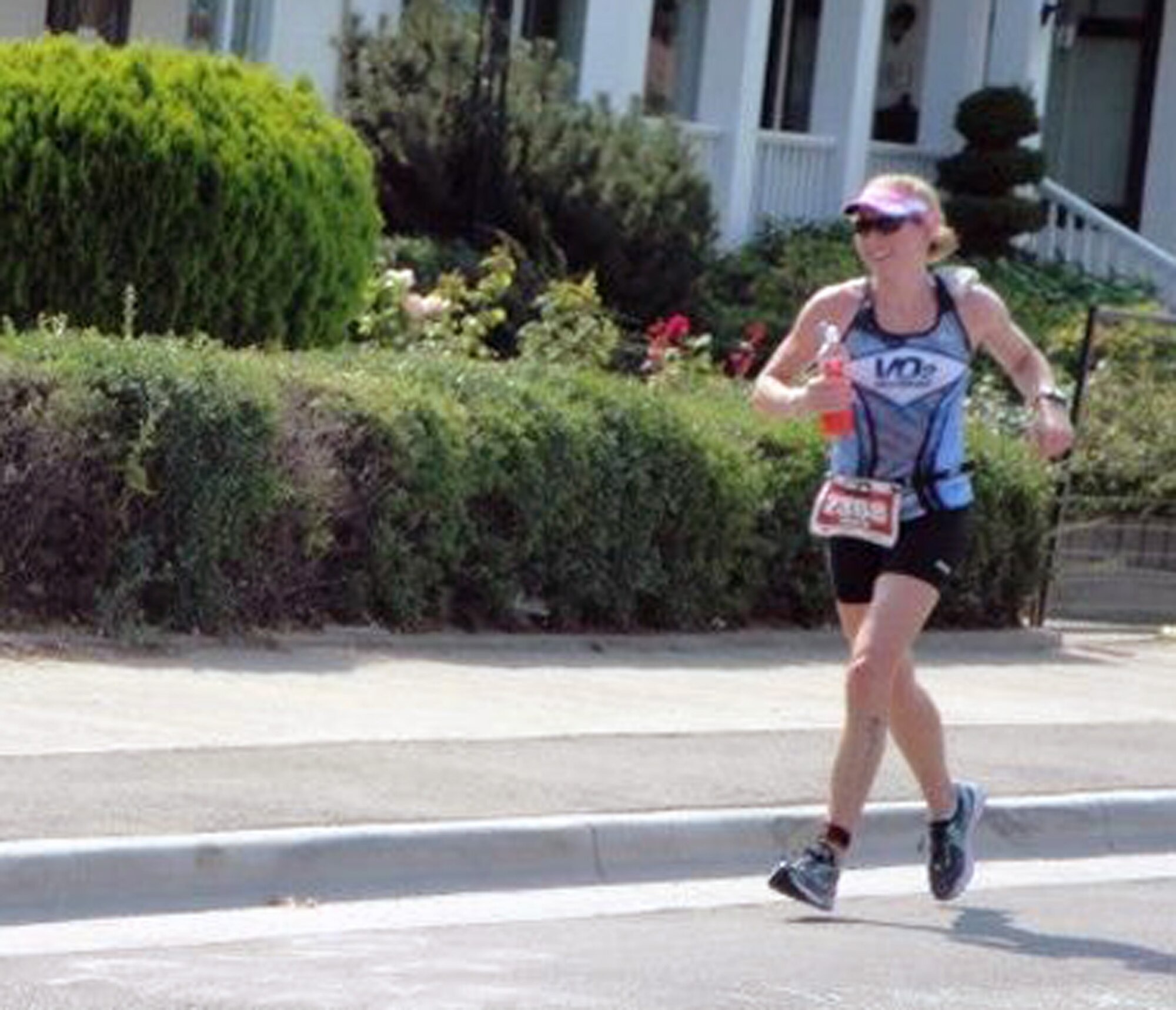 MCCHORD FIELD, Wash. - Capt. Judy Coyle, 728th Airlift Squadron pilot here, competed in the Canada Ironman competition in Penticton, Canada, Aug. 26.  Taking second place in the women 35-39 category with a time of 10 hours, 31 minutes and 53 seconds, Coyle not only earned bragging rights to the Ironman title, she earned a position to compete in the Ironman World Championship in Kailua-Kona, Hawaii, Oct. 13.  (Courtesy photo)