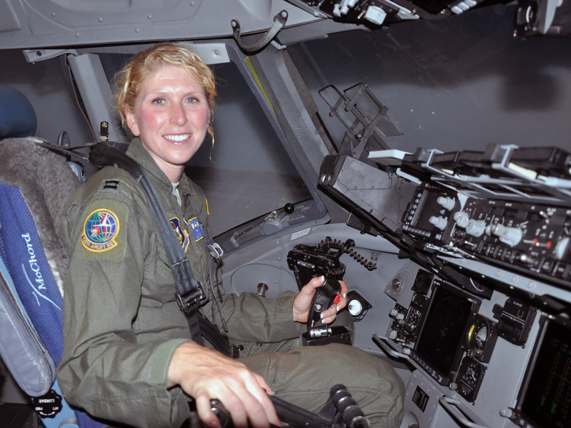 MCCHORD FIELD, Wash. – Capt. Judy Coyle, 728th Airlift Squadron pilot, trains in a C-17 simulator here, Sept. 8.  Coyle competed in the Canada Ironman competition in Penticton, Canada, Aug. 26, taking second place in the women 35-39 category with a time of 10 hours, 31 minutes and 53 seconds.  (U.S. Air Force photo by Tech. Sgt. Elizabeth Moody)