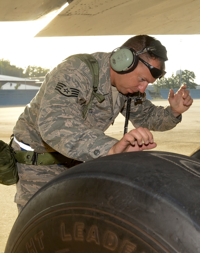 U.S. Air Force Staff Sgt. Paul Blando, 116th Air Control Wing crew chief , inspects the brake system of an E-8C Joint STARS during an operational readiness inspection at Robins Air Force Base, Ga., Sept. 8, 2012.  Airmen from the 116th and 461st ACW are showcasing their ability to perform assigned tasks in wartime, contingency or force sustainment operation. Inspection areas include initial response, employment, mission support and ability-to-survive and operate in a chemical environment. (National Guard photo by Master Sgt. Roger Parsons/Released)