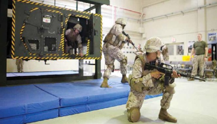 Corpsmen prioritize and treat simulated casualties at a collection point
during a training event at Camp Hansen Aug. 29. “The purpose of the
collection point is to stabilize (casualties) and determine which are priority
cases,” said Petty Officer 3rd Class Demetrio C. Pineda, a corpsman with 3rd
Med. Bn., CLR-35, 3rd MLG, III MEF.