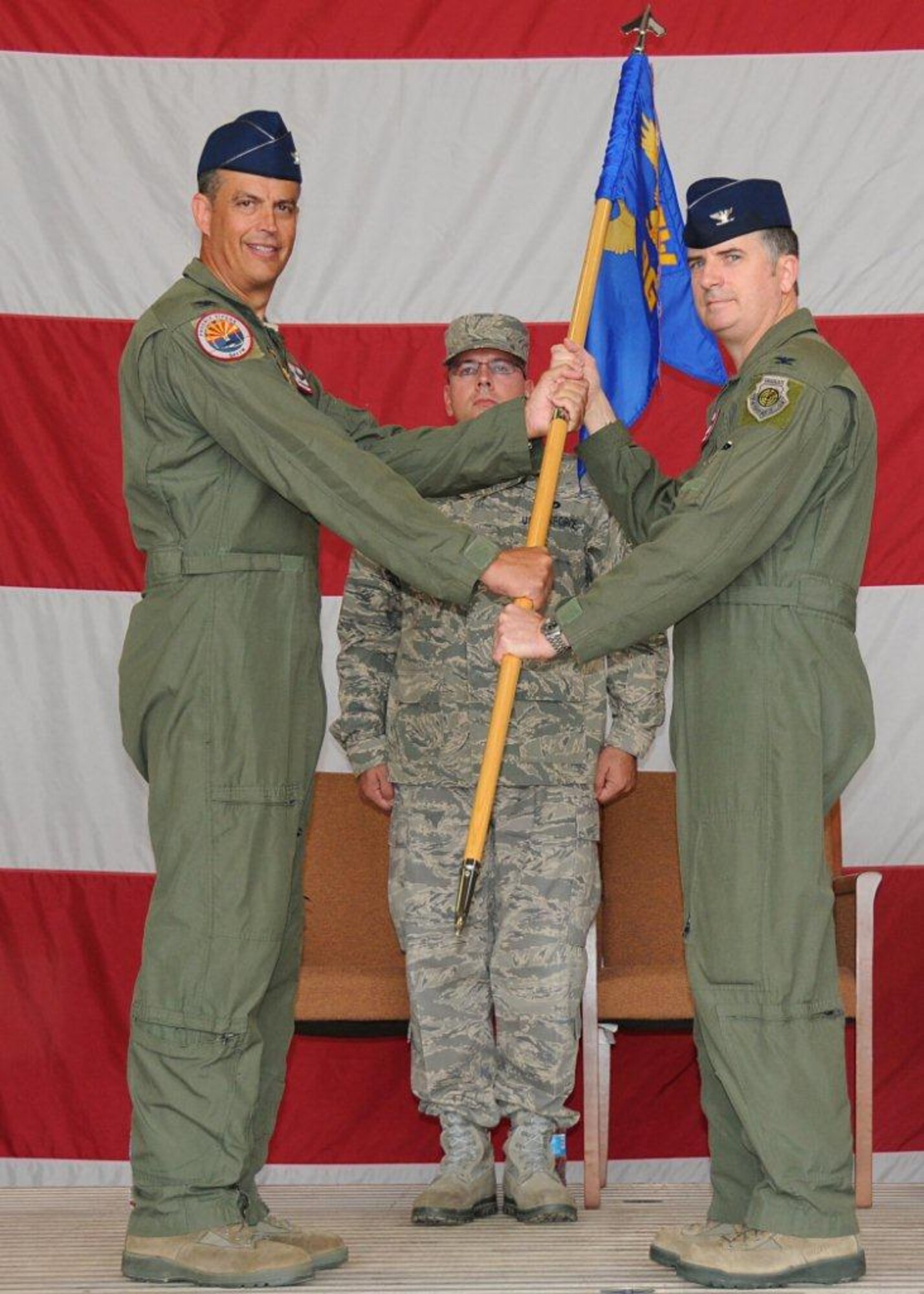 The 944th Operations Group welcomed a new commander during a change-of-command ceremony here September 7. Col. Gregory Jones, former director of the F-35 Academic Training Center at Eglin Air Force Base, Fla., succeeded Col. David Garfield as commander of the 944th Operations Group in a ceremony presided by Col. Jose Monteagudo, commander, 944th Fighter Wing. (U.S. Air Force photo by Staff Sgt. Josh Nason)