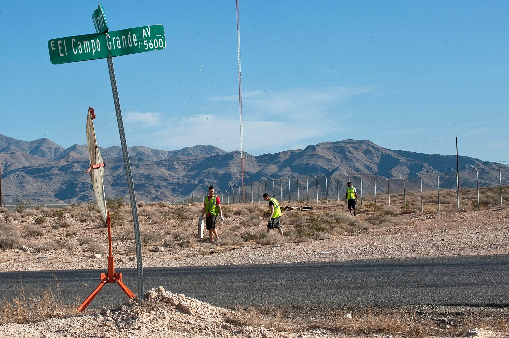 U.S. Air Force Airmen, pick up trash along side East El Campo Grande Avenue  Sept. 9 2012, in Las Vegas. Members of the 99th Medical Group coordinated Nellis participation for the effort. Nellis Airmen, retirees, and Reserve Officer Training Corps cadets all volunteered for this event. (U.S. Air Force photo by Staff Sgt. Christopher Hubenthal)