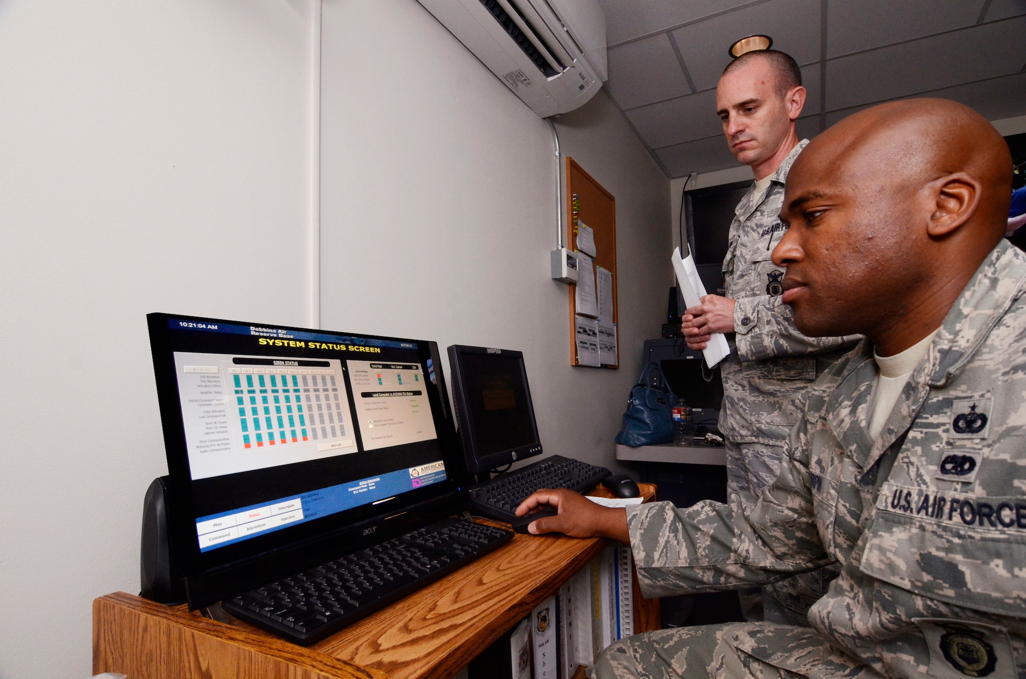 Security forces and Fire Department first responders    demonstrate the use of the Dobbins Air Reserve Base “Giant Voice” notification system essential to alert installation personnel of any emergency situations Aug 7.