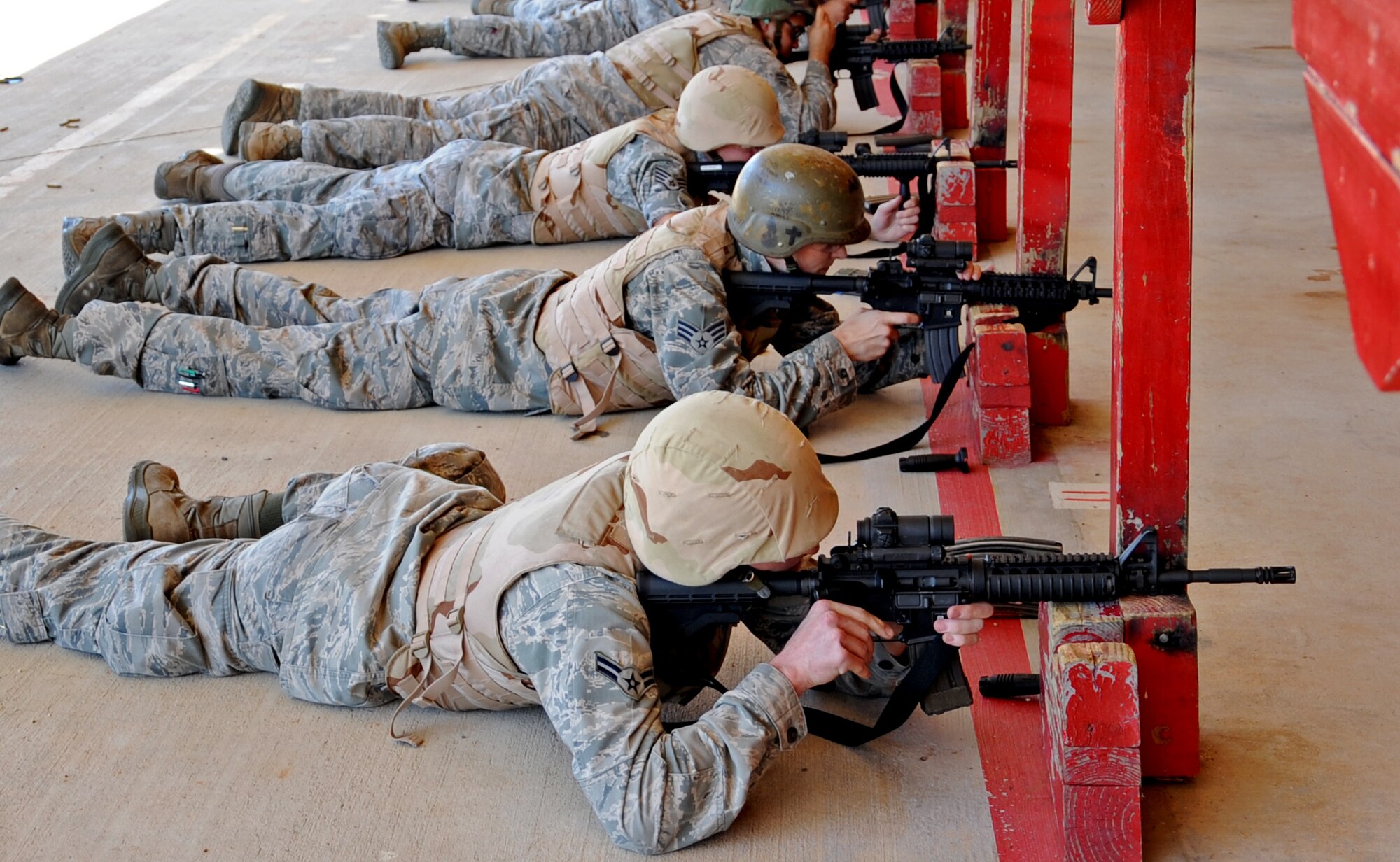 Team Barksdale members qualify on the M4 Carbine on Barksdale Air Force Base, La., Sept. 10. The course is designed to ensure Barksdale Airmen have all the necessary training needed to protect themselves in a deployed environment. (U.S. Air Force photo/Senior Airman Sean Martin) (RELEASED)