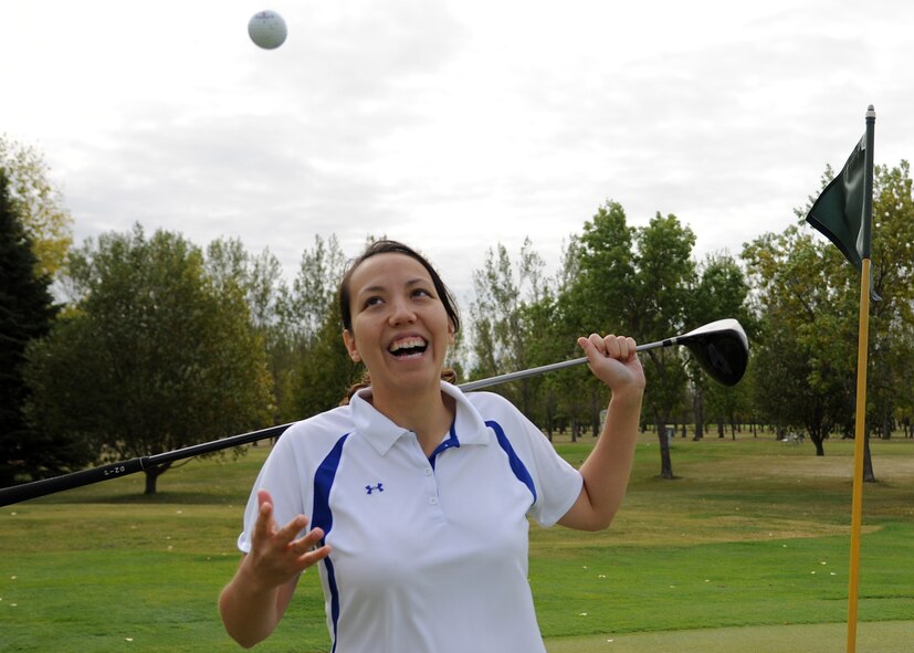 Staff Sgt. Tina Kay, 319th Operations Support Squadron, pauses for a photo at Plainsview Golf Course, Sept. 7, 2012, on Grand Forks Air Force Base, N.D. Kay was selected to compete for the U.S. Air Force women’s golf team, her second stint as a member. (U.S. Air Force photo/Airman 1st Class Ashley N. Taylor)