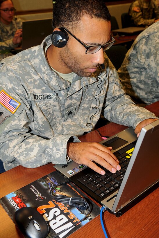 U.S. Army Sgt. Marcus Rogers, 576th Inland Cargo Transfer Company cargo specialist, begins the interactive portion of the Virtual Battle Space 2 simulator training at Fort Eustis, Va., Sept. 6, 2012. The system provides interactive training, using an advanced computer simulator to immerse Soldiers in realistic battlefield scenarios. (U.S. Air Force photo by Staff Sgt. Ashley Hawkins/Released)