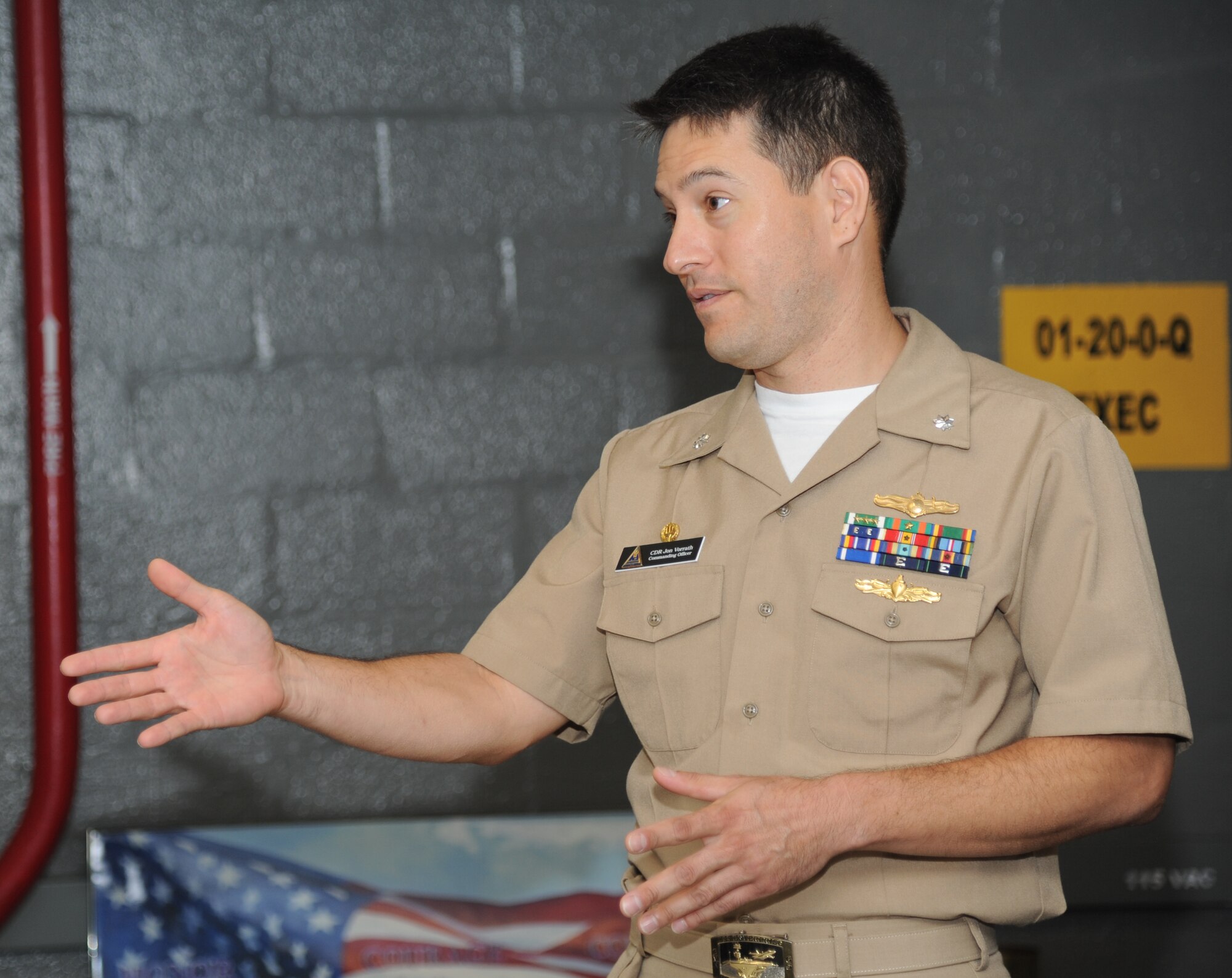 Navy Commander Jonathan Vorrath, Center For Naval Aviation Technical Training Unit Keesler Commanding Officer, provides remarks to sailors during a graduation ceremony Sept. 7, 2012, at Allee Hall, Keesler Air Force Base, Miss.  (U.S. Air Force photos by Kemberly Groue)