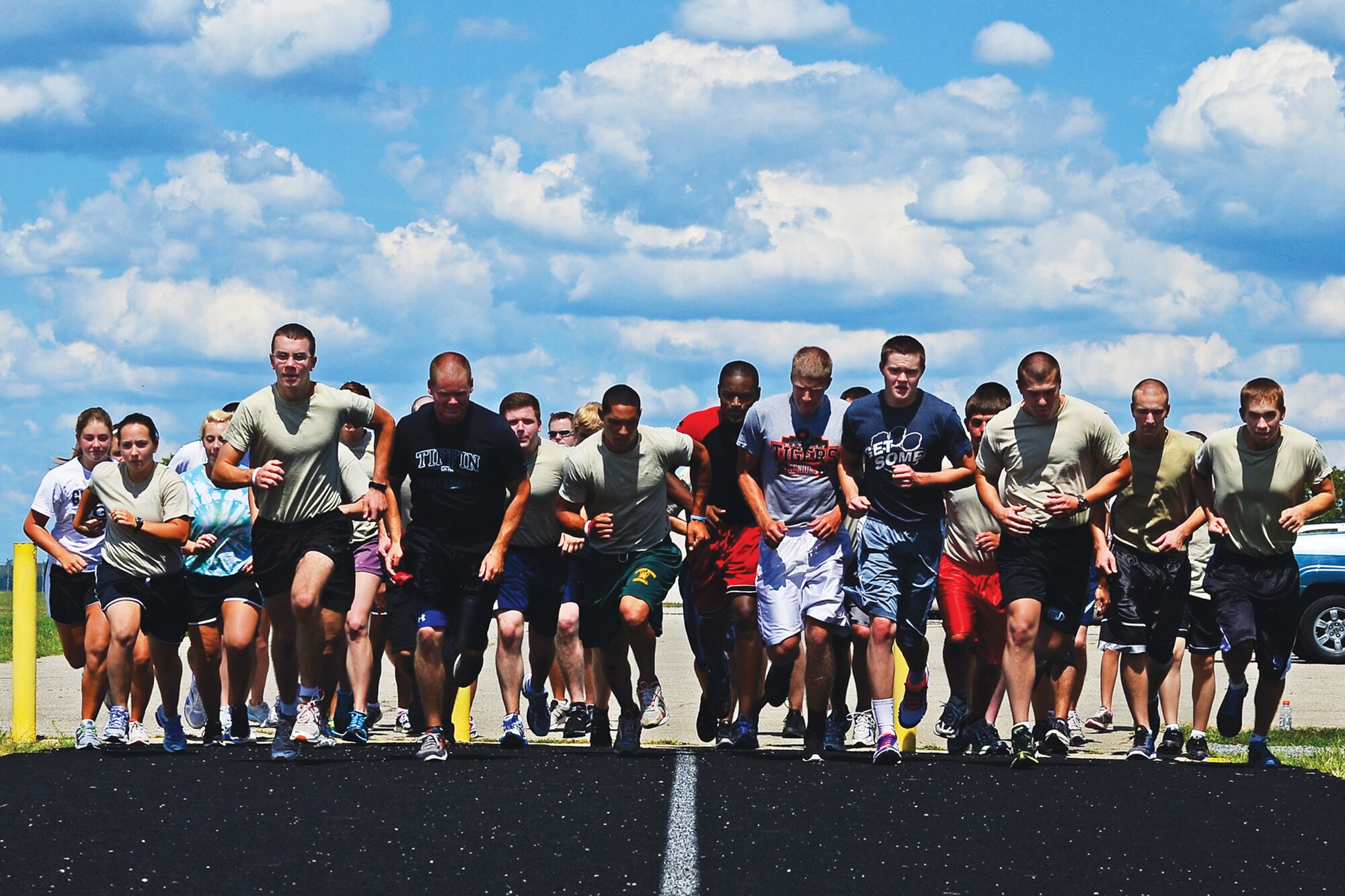 WRIGHT-PATTERSON AIR FORCE BASE, Ohio - Members of the 445th Development and Training Flight participate in a physical training session at Wright-Patterson Air Force Base, Ohio, Aug. 18. The 445th AIrlift Wing's D&TF is a new Air Force Reserve Command program designed to increase the completion rate and save the AFRC money by preparing recruits for BMT through a thorough introduction to the Air Force Reserve.  (U.S. Air Force photo/Staff Sgt. Mikhail Berlin)