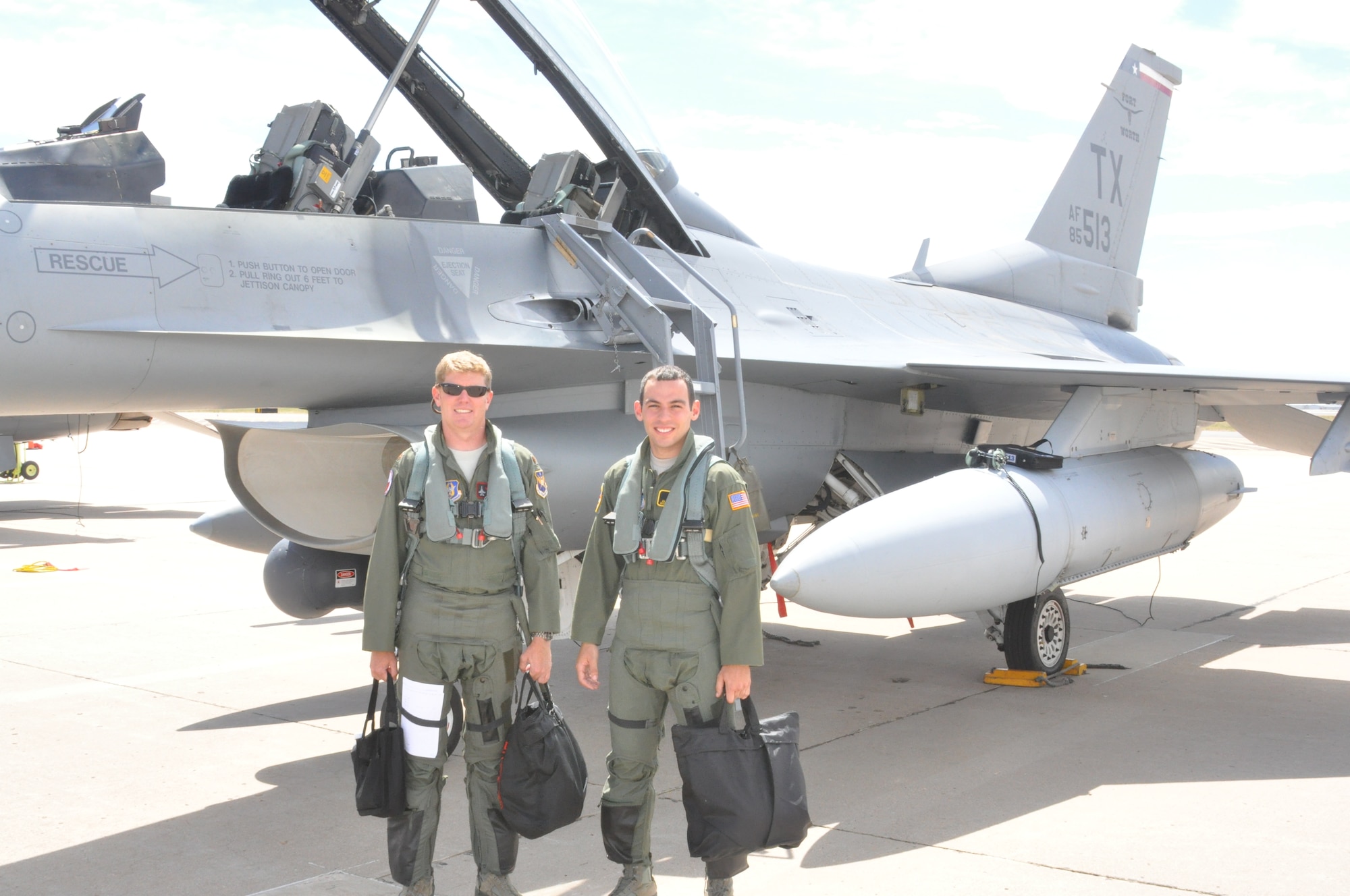 Maj. Charles Huber and Cadet Alan Acosta before the incentive flight during the Cadet Sponsorship Program visit to the Air Force Academy.  The 301st is the first Reserve unit to sponsor a cadet squadron.  The 301st sponsors Cadet Squadron 34. (U.S. Air Force Photo/Capt. Rodney Ellison)