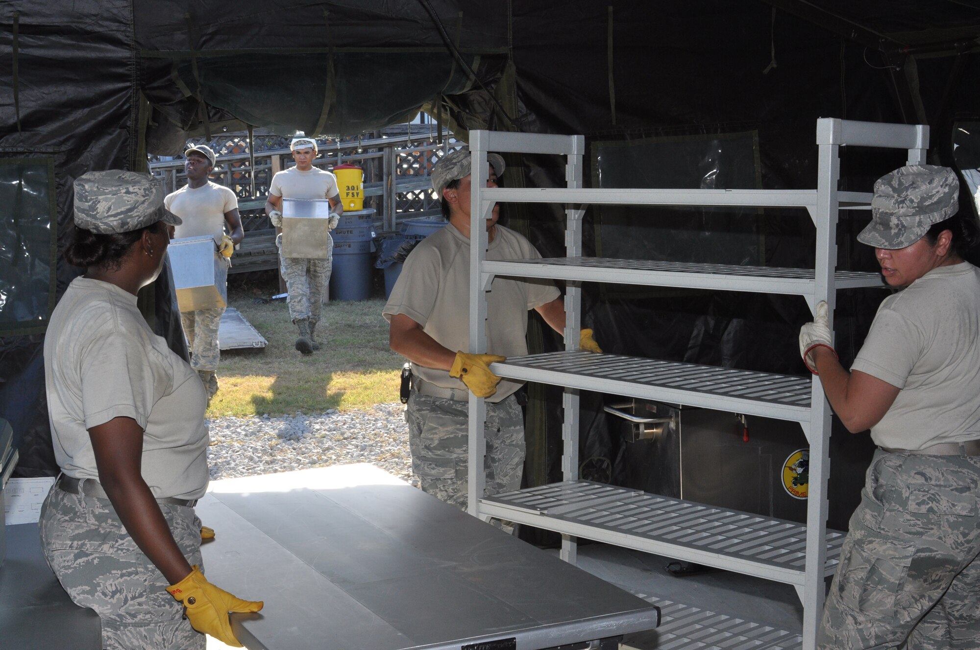 FSV team members finish Single Pallet Expeditionary Kitchen assembly during the Hennessy evaluation.  (U.S. Air Force photo/Tech. Sgt. Chris Bolen)