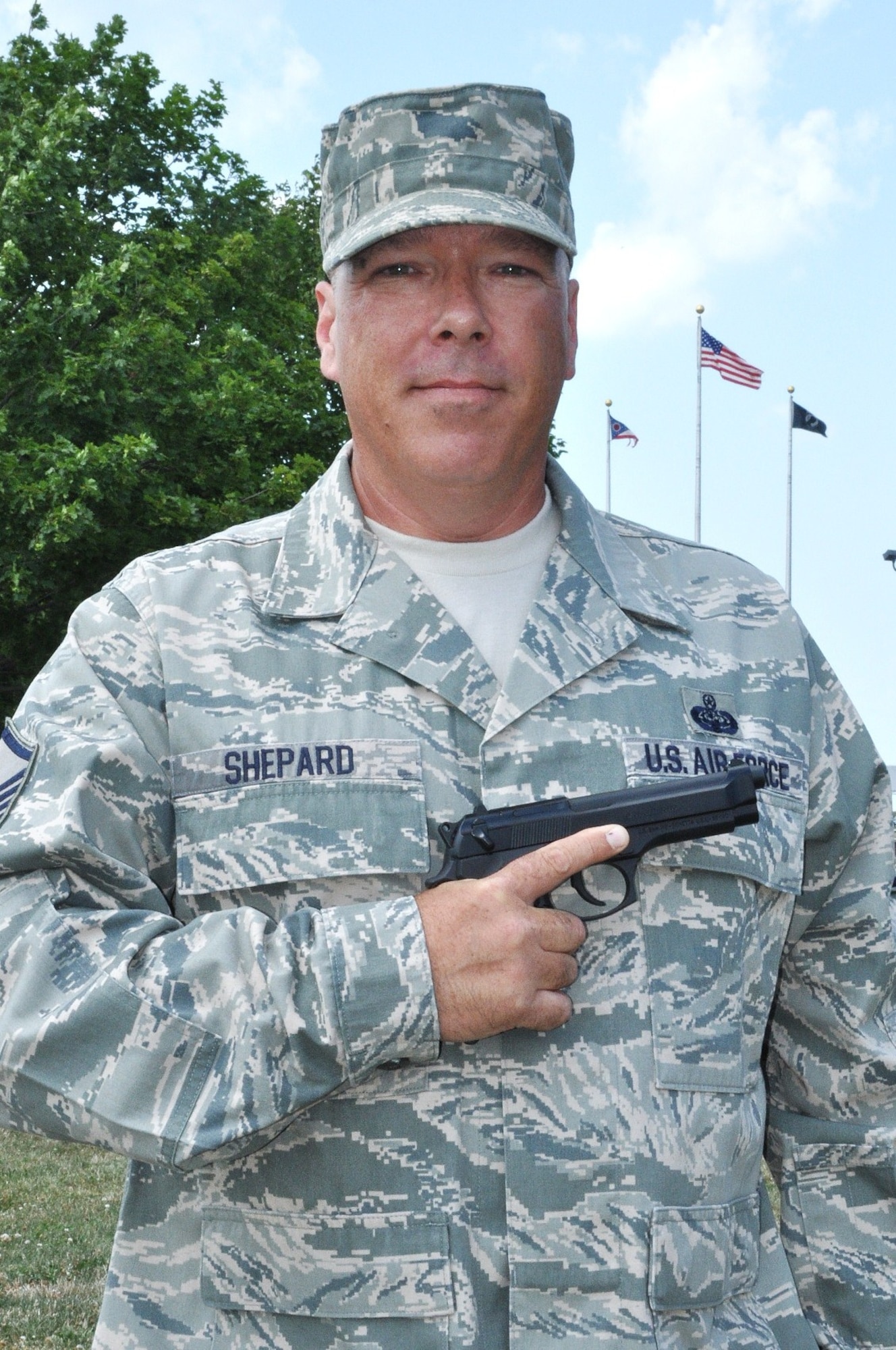 Master Sgt. Craig Shepard holds an M-9 pistol. Shepard, a member of the 127th Communications Squadron at Selfridge Air National Guard Base, Mich., won 2012 National Trophy Pistol Match held this summer at Camp Perry, Ohio. In his first shooting competition ever, Shepard placed first among 400 competitors. 