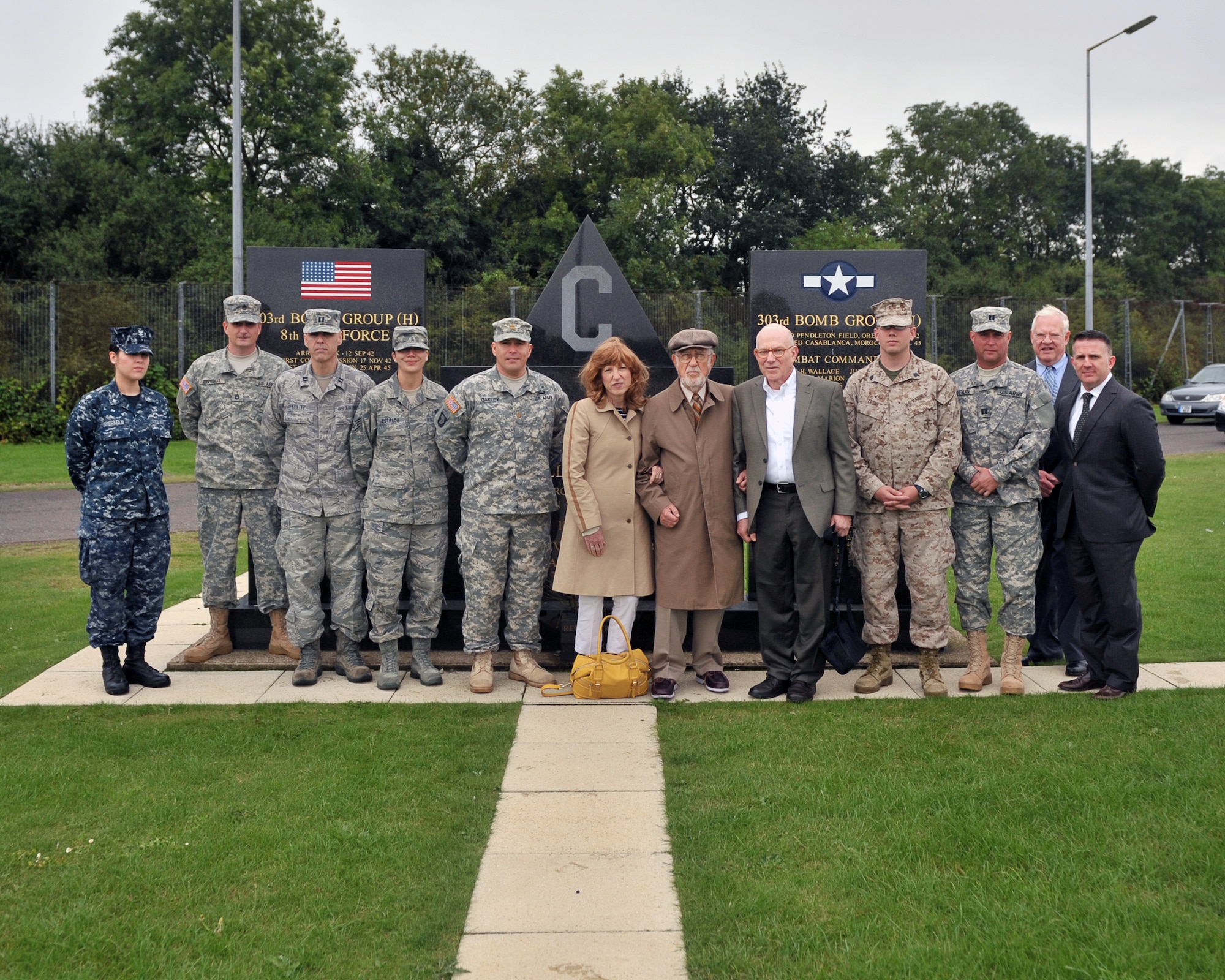Retired Lt. Col. Albert Levin who served during World War II as a B-17 navigator is welcomed back to his old base at RAF Molesworth after 68 years.  In the photo he is joined by (L-R) Petty Officer 3rd. Class Laura Sherman, Sgt. First Class Dallas Corvinus, Chaplain (Capt.) David Reedy, Staff Sgt. Adriana Estrada, Maj. Luis Oakley, Ms. Susan Levin, Lt. Col. Levin, Mr. Paul Levin, Staff Sgt. Kenneth Lurch, Capt. Frank Huffman, Mr. Peter Park, and Mr. Joe Decie, 