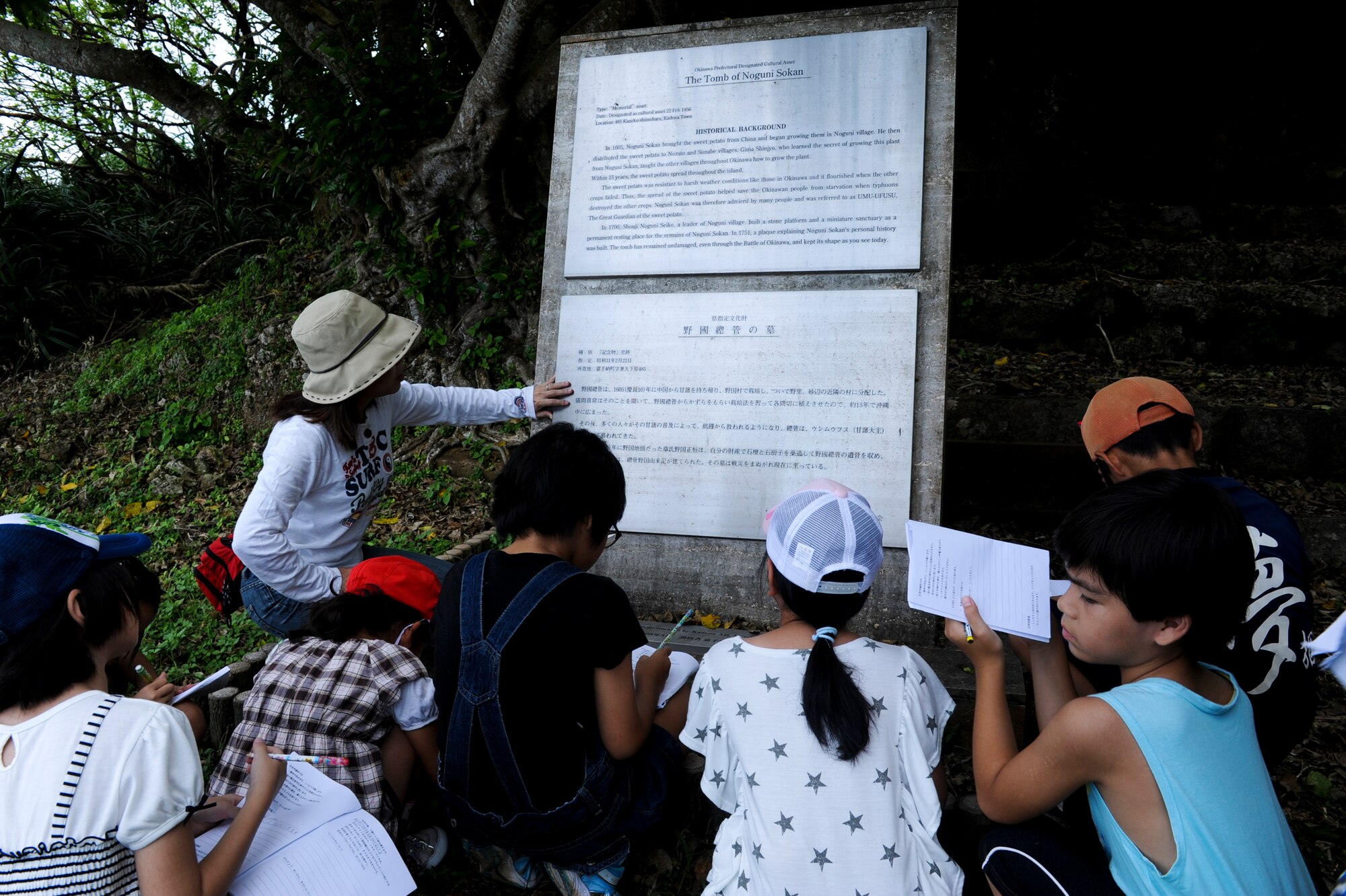 Students from Yara Elementary School in Kadena Town visit the Tomb of Noguni Sokan during a social studies tour at the Kadena Marina on Okinawa, Japan, Sept. 7, 2010. Sokan is a historical celebrity in Okinawa, who introduced sweet potatoes from China over 400 years ago and saved the local people from starvation. (U.S. Air Force photo/Airman 1st Class Justin Veazie)