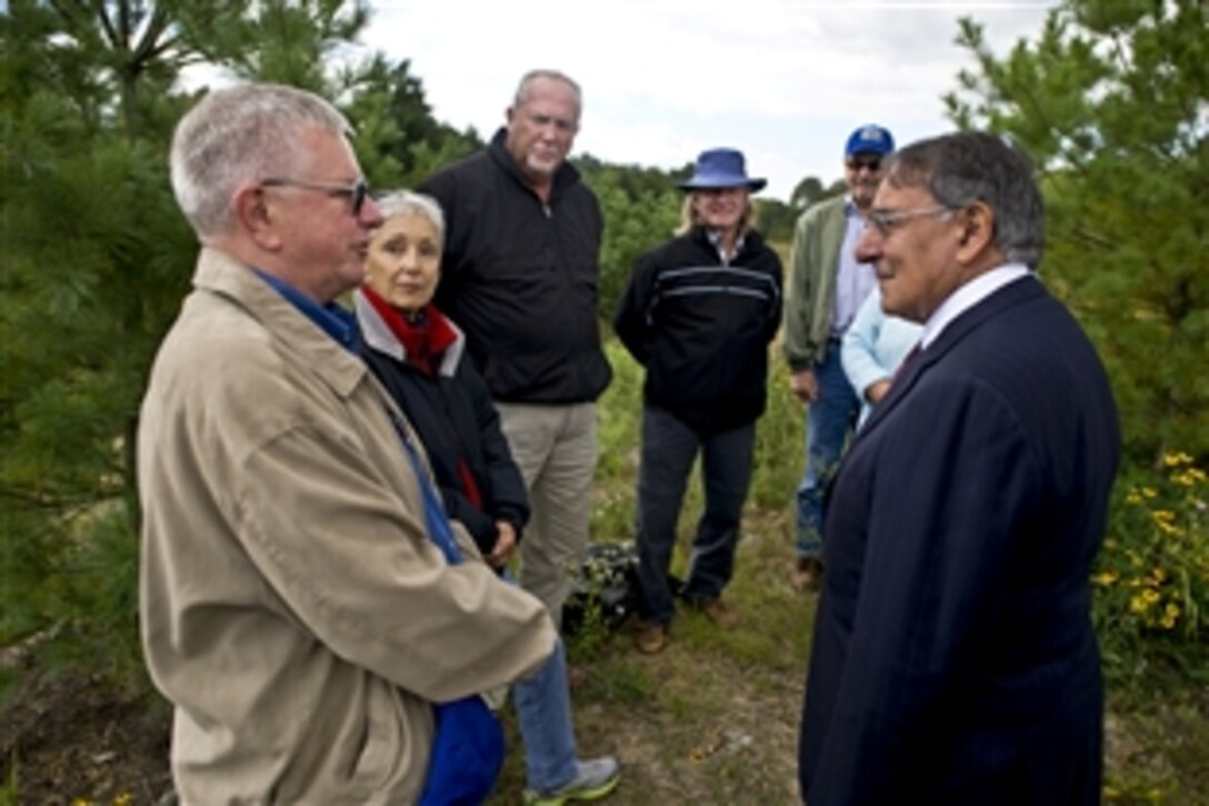 On the eve of the 11th anniversary of the Sept. 11, 2001, terrorist attacks on the United States, Defense Secretary Leon E. Panetta speaks with family members of victims of United Airlines Flight 93 in Shanksville, Pa., Sept. 10, 2012.