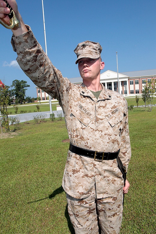 Cpl. Thomas Chevalier, KC-130J Hercules mechanic with Marine Aerial Refueler Transport Squadron 252 and a student at Cherry Point Corporals Leadership Course Class 274-12, holds his "draw sword" during an introduction to sword manual, Aug. 17. The three-week course is the first Professional Military Education class enlisted Marines attend and focuses on leadership, history and tradition of Marine Corps corporals.