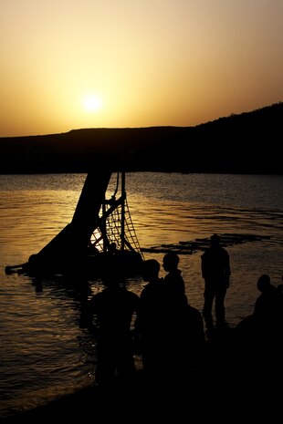 Marines with Bravo Company, Battalion Landing Team 1st Battalion, 2nd Marine Regiment, 24th Marine Expeditionary Unit, set up a water obstacle course in Djibouti, Aug. 30, 2012. The course is a part of a Training Force, or T-Force, package focused on primitive infantry skills. The 24th MEU is deployed with the Iwo Jima Amphibious Ready Group as a theater reserve and crisis response force throughout the U.S. Central Command in the Navy's 5th Fleet area of responsibility.