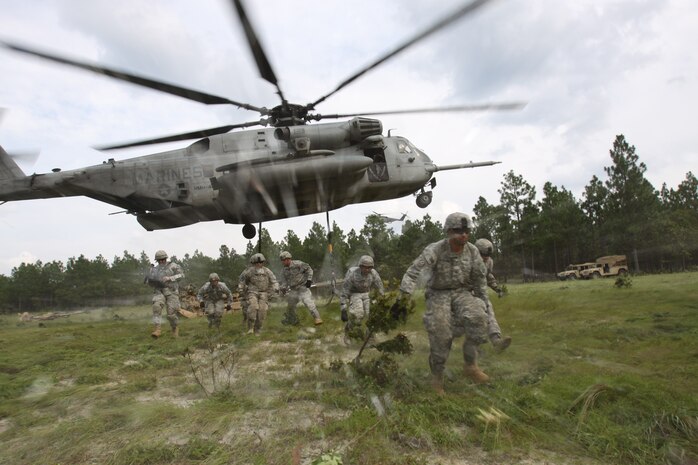 Two CH-53E Super Stallions with Marine Heavy Helicopter Squadron 461 joined up with the Army’s 18th Fires Brigade to support them out with a field exercise aboard Fort Bragg, N.C., Aug. 23. The Marines moved several M777 Howitzers, performed casualty evacuations and troop movement.

