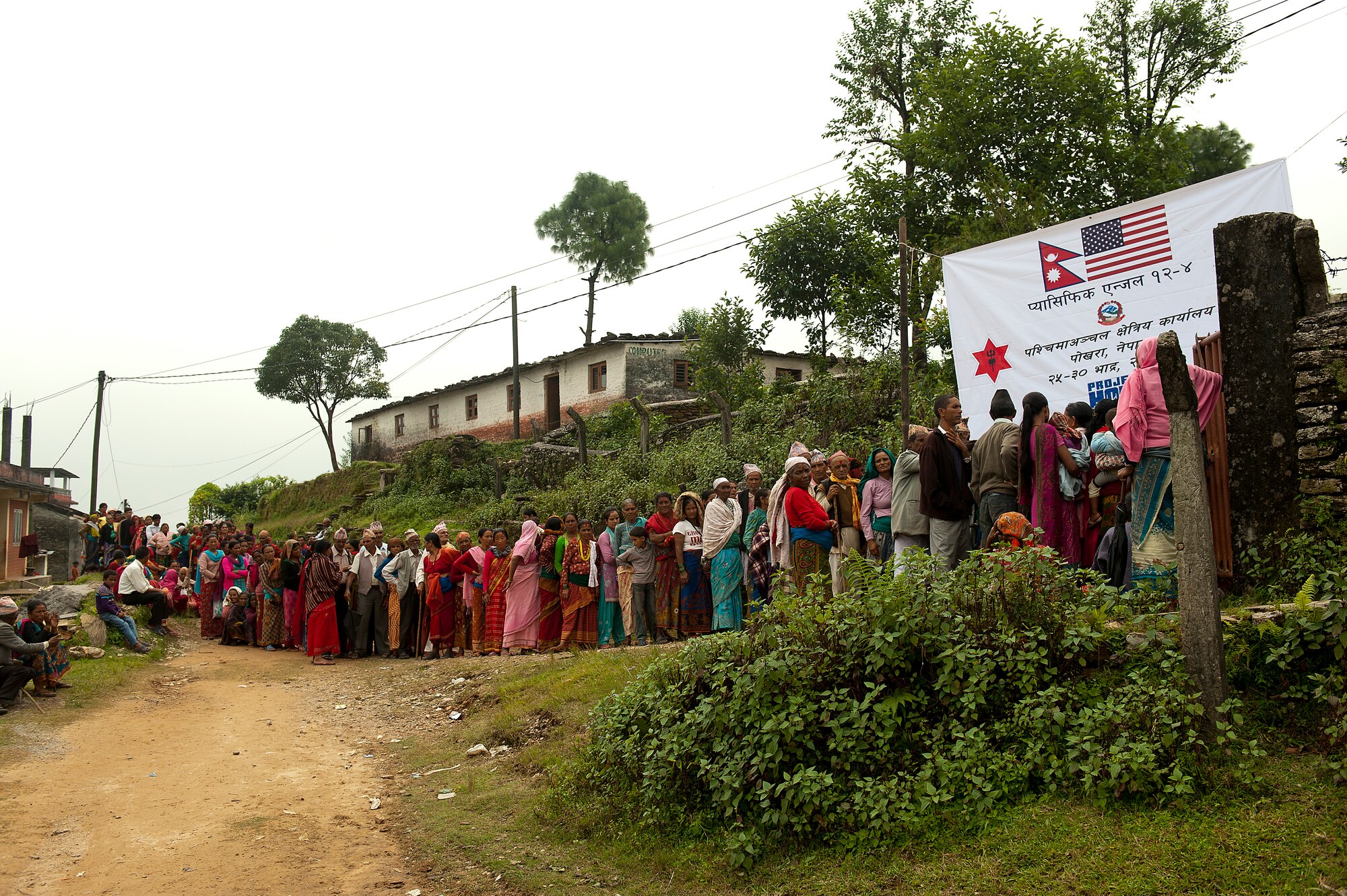Hundreds of Nepalis wait in line at at Nau Danda Health Post of Dhikur Pokhari Village Development Committe (VDC) of Kaski District to be seen by doctors participating in U.S. Pacific Command's Operation Pacific Angel 12-4, Nepal on Sept. 10, 2012. Pacific Angel 12-4 is a Pacific Air Forces planned event that enhances humanitarian assistance and disaster relief capabilities between the United States and Pacific partners. The U.S. was invited by the Nepal government to provide support by conducting medical, optometry, and civil engineering programs. Operations like Pacific Angel build and sustain relationships with our multinational partners in the Asia-Pacific region. (U.S. Air Force photo/Master Sgt. Jeffrey Allen)
