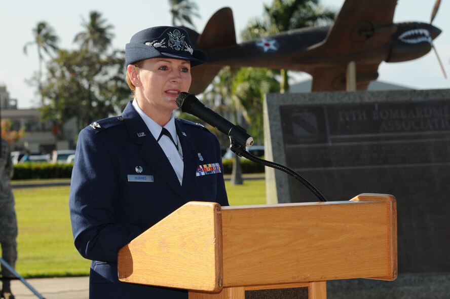 Col. Robie V. Hughes, Commander, 15th Medical Group, Joint Base Pearl Harbor-Hickam, Hawaii speaks during a change of command ceremony for the 15th Medical Operations Squadron on 2 Aug 2012.  Photo by David D. Underwood, Jr.