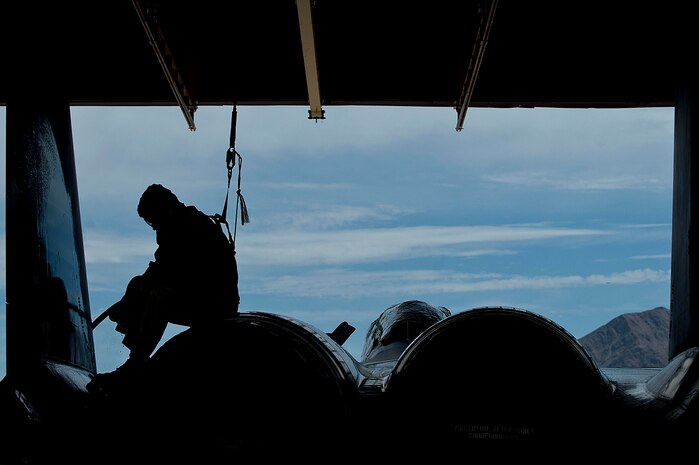 U.S. Air Force Airman 1st Class Chris Stonebrook, 757th Aircraft Maintenance Squadron crew chief, inspects the cleanliness of the tail of an F-15E Strike Eagle at the wash rack here Sept. 10, 2012, at Nellis Air Force Base, Nev. Washing an F-15E Strike Eagle takes approximately four hours for a crew of three to clean the aircraft and reduce corrosion and salt build up. (U.S. Air Force photo by Staff Sgt. Christopher Hubenthal)