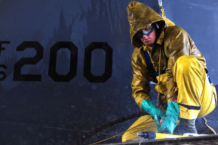 Airman 1st Class Chris Stonebrook, 757th Aircraft Maintenance Squadron crew chief, washes the tail of an F-15E Strike Eagle at the wash rack here Sept. 10, 2012, at Nellis Air Force Base, Nev. Washing aircraft every 180 days at Nellis AFB helps to extend its life and reliability by preventing corrosion build-up. The more exposure an installation has to salt water the more frequently the aircraft is required to be washed. (U.S. Air Force photo by Staff Sgt. William P.Coleman)