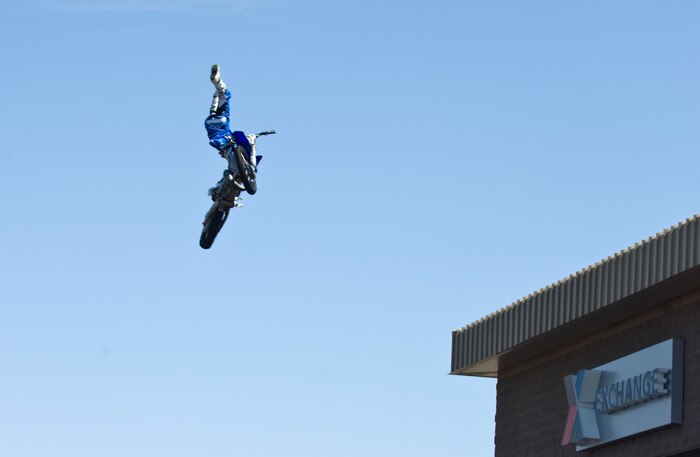 Ted Culbertson, Red Bull Jams motocross rider, jumps his bike for a crowd Sept. 8, 2012, at The Exchange here. The motocross riders who performed here were Ted Culbertson, Keith Sayer and Rodney Renner. (U.S. Air Force photo by Senior Airman Jack Sanders)