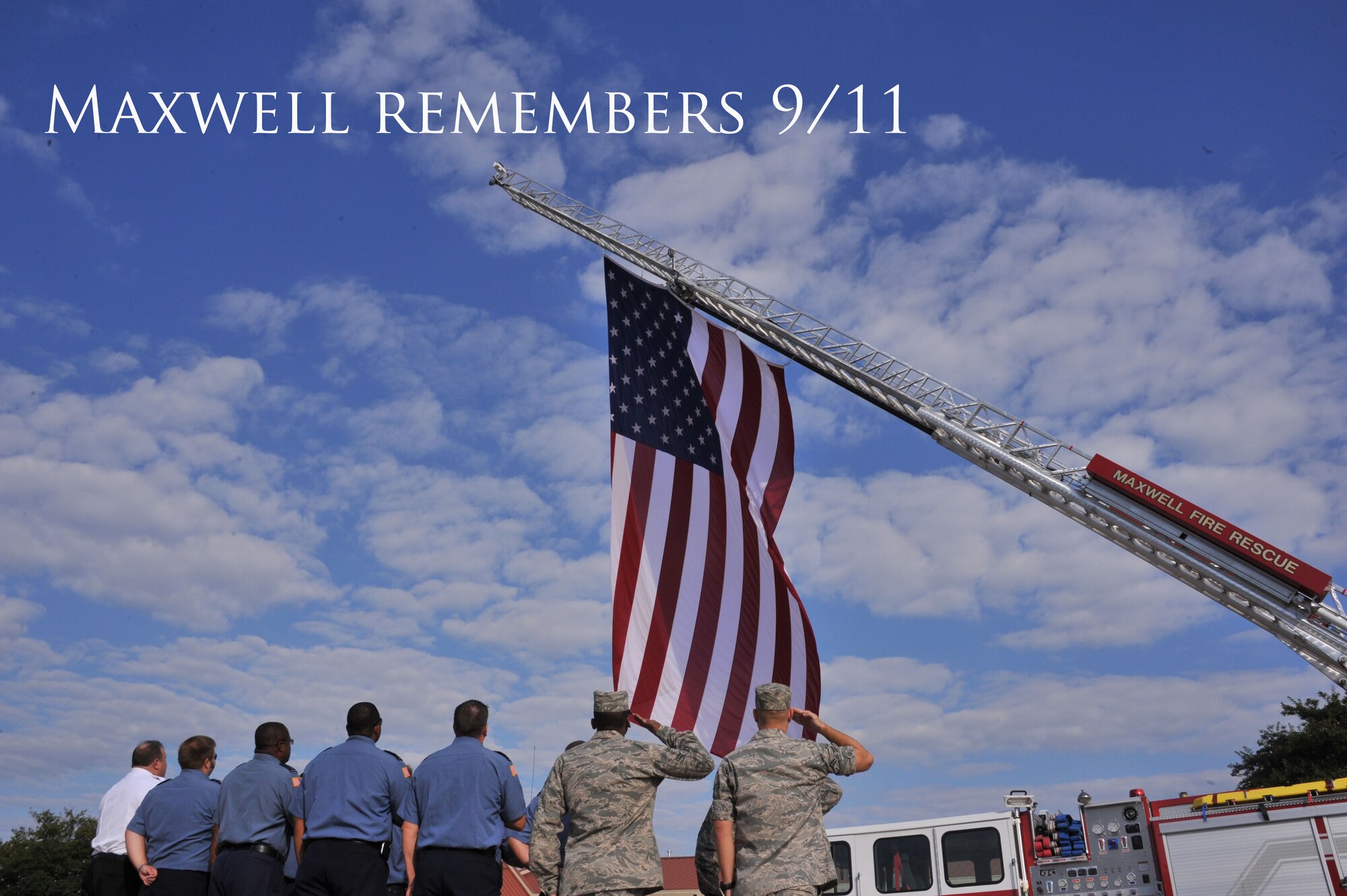 Member of the Maxwell Air Force Base Fire Department remember those who died 11 years ago in the Sept. 11, 2001 tragedy as they fly the American flag at half- staff, Sept. 11. Both civilian and military firefighters paused their day to hold a moment of silence and a prayer on the anniversary of the attack on America. (U.S. Air Force photo by Airman 1st Class William Blankenship)