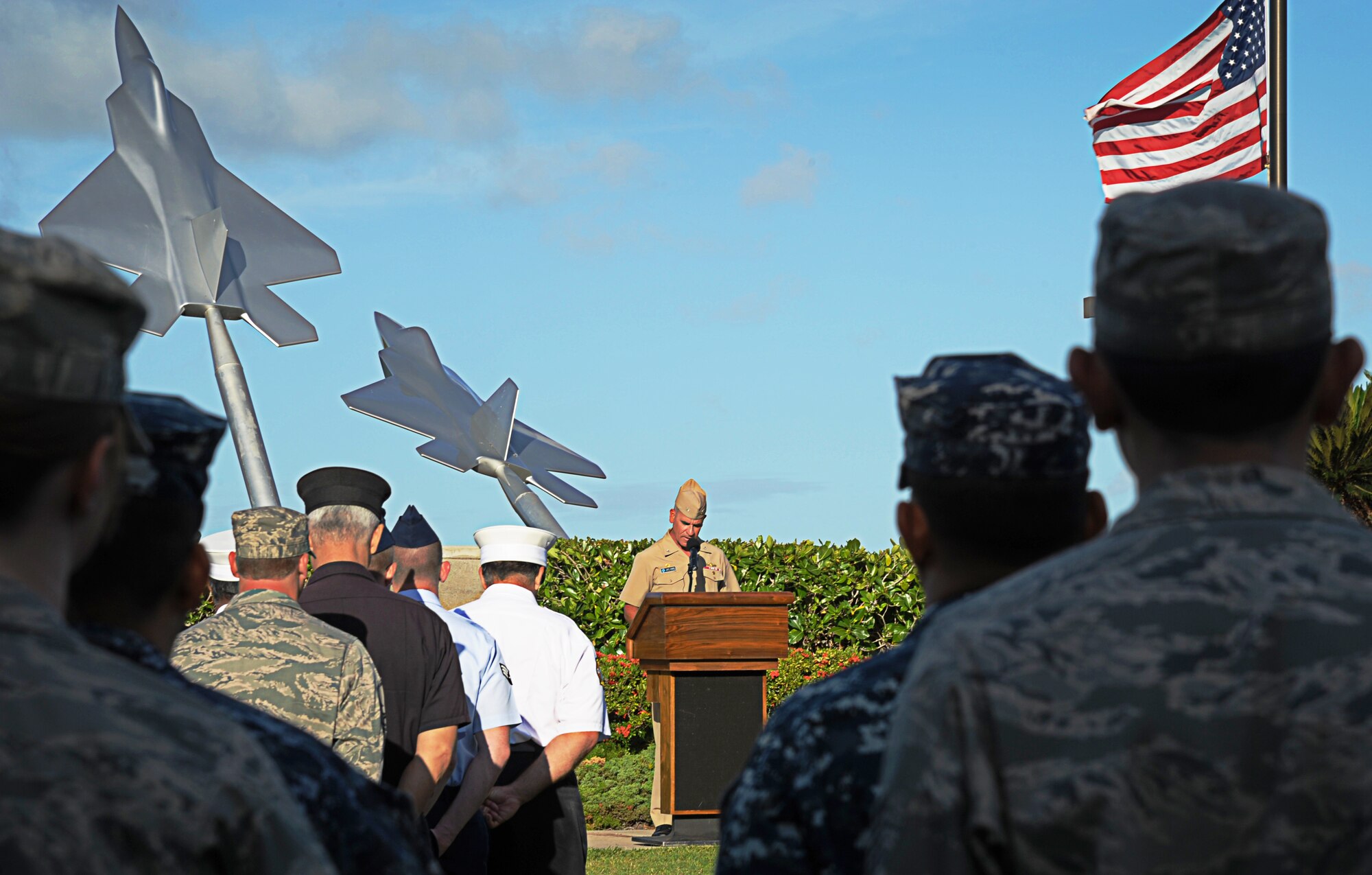 Federal Fire Department members, alongside U.S. military members, pay their respects during a Sept. 11th Remembrance Ceremony on Joint Base Pearl Harbor-Hickam, Hawaii, Sept. 11, 2012. This year marks the 11th anniversary of the attacks on the World Trade Center, the Pentagon, and the crash in Shanksville, Pennsylvania. (U.S. Air Force photo/Senior Airman Lauren Main)