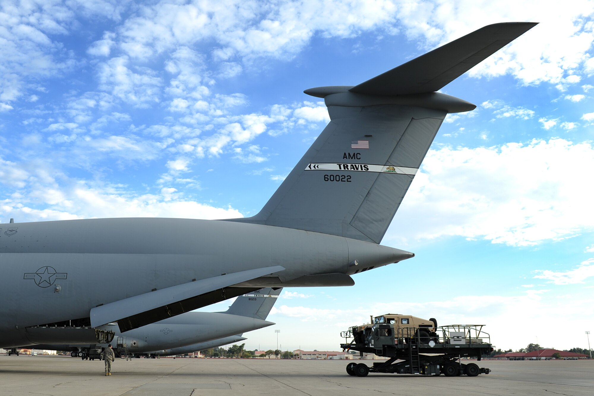 Members of the 621st Contingency Response Wing load equipment aboard an awaiting C-5 Galaxy during Exercise Gladiator Challenge. The exercise scenario included the CRW providing a contingency response team to respond to a simulated devastating earthquake in the San Francisco Bay area, which displaced 750, 000 simulated people. (U.S. Air Force Photo/MSgt Stan Parker)