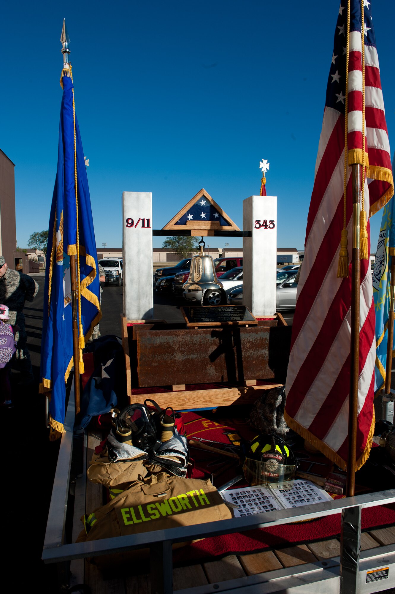 A 9/11 memorial float including a section of a steel I-beam from one of the Twin Towers led the procession of Airmen and first responders participating in the  9/11 Remembrance Ruck March on Ellsworth Air Force Base, S.D., Sept. 8, 2012. Nearly 150 Ellsworth Airmen, family members and friends teamed up with area police officers, firefighters and other first responders for the 11-mile rucksack march to commemorate the 11th anniversary of 9/11. (U.S. Air Force photo by Airman 1st Class Kate Thornton-Maurer)