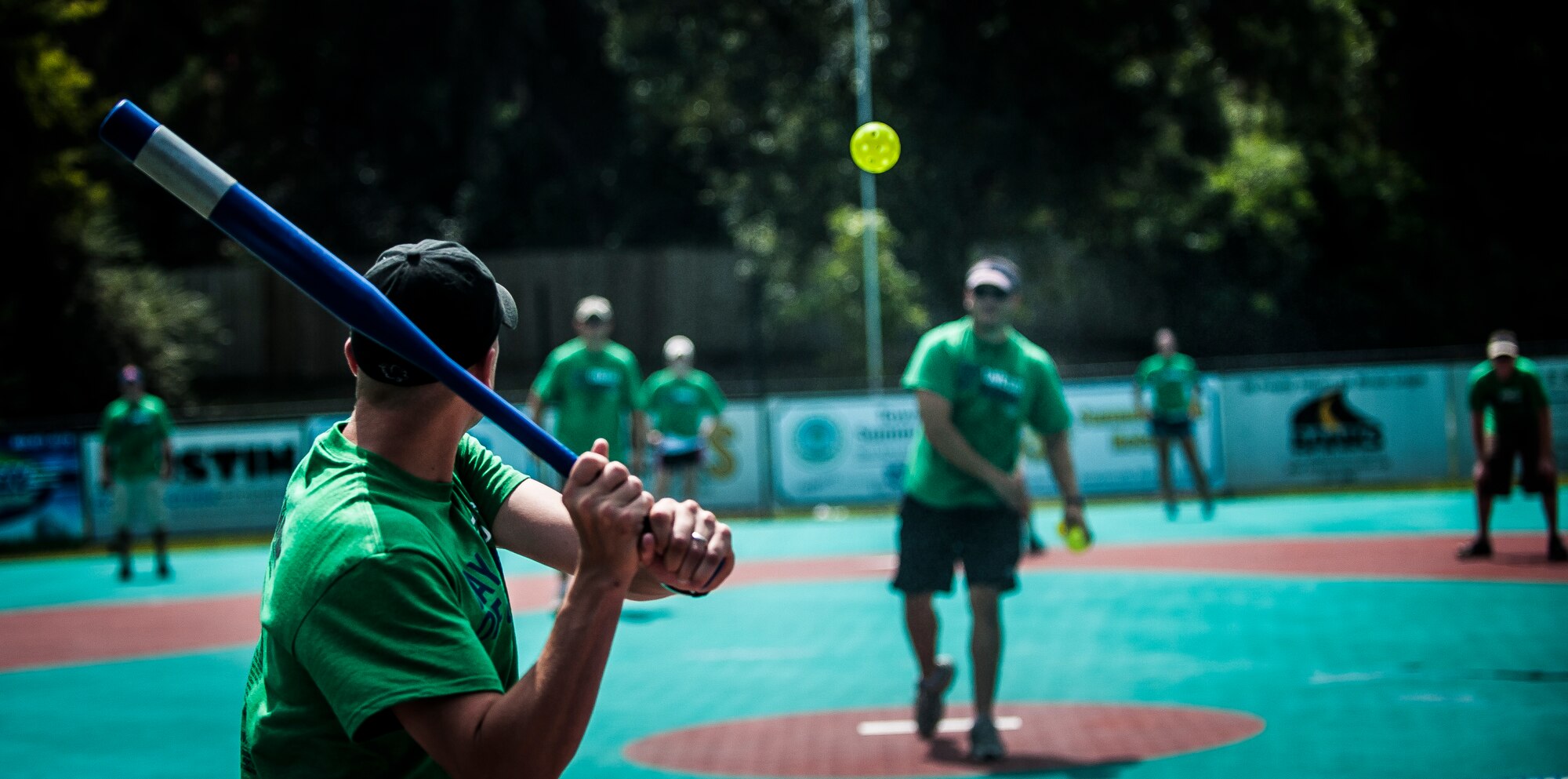 Senior Airman Alex Castillo, 437th Aircraft Maintenance Squadron jet mechanic, unhooks a hose he was using for power washing Sept. 7, 2012, at the Miracle League Ball Park in Summerville, S.C. Castillo and several other Airmen from the 437th Airlift Wing volunteered to prepare the park for the upcoming season. The Miracle League provides opportunities for individuals with disabilities to play baseball. The Day of Caring, organized locally by the Trident United Way, saw more than 8,500 volunteers working on more than 300 projects around the Lowcountry. (U.S. Air Force photo/Senior Airman Dennis Sloan)