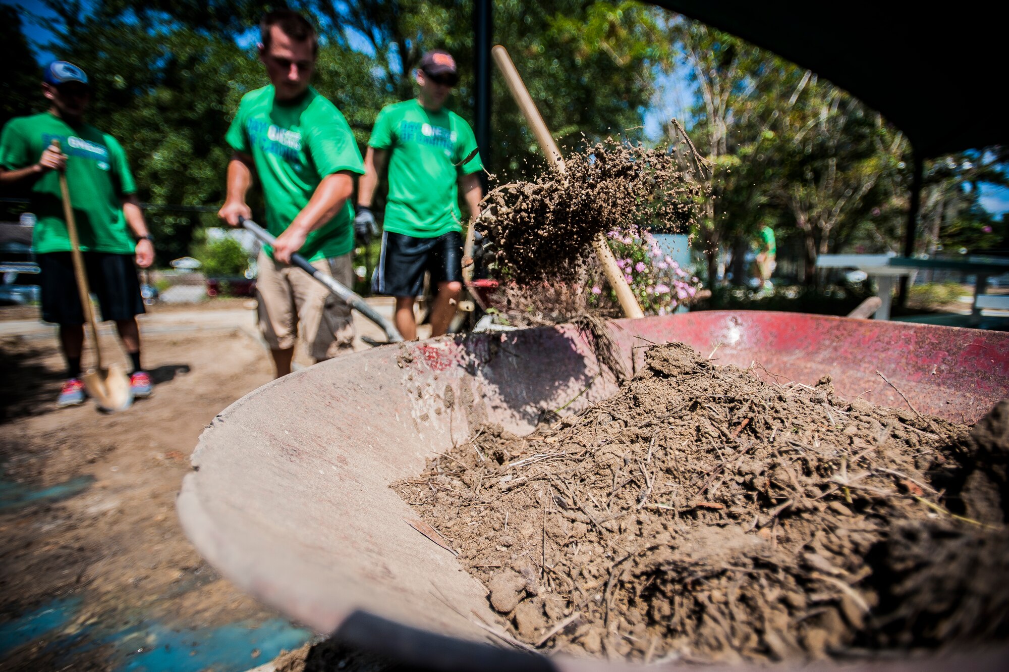 Technical Sgt. Adam Clarke, 437th Maintenance Group quality assurance specialist, excavates a hole for new concrete Sept. 7, 2012, at the Miracle League Ball Park in Summerville, S.C. Clarke and several other Airmen from the 437th Airlift Wing volunteered to prepare the park for the upcoming season. The Miracle League provides opportunities for individuals with disabilities to play baseball. The Day of Caring, organized locally by the Trident United Way, saw more than 8,500 volunteers working on more than 300 projects around the Lowcountry. (U.S. Air Force photo/Senior Airman Dennis Sloan)