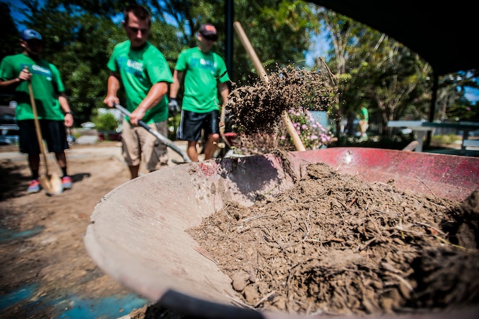 Technical Sgt. Adam Clarke, 437th Maintenance Group quality assurance specialist, excavates a hole for new concrete Sept. 7, 2012, at the Miracle League Ball Park in Summerville, S.C. Clarke and several other Airmen from the 437th Airlift Wing volunteered to prepare the park for the upcoming season. The Miracle League provides opportunities for individuals with disabilities to play baseball. The Day of Caring, organized locally by the Trident United Way, saw more than 8,500 volunteers working on more than 300 projects around the Lowcountry. (U.S. Air Force photo/Senior Airman Dennis Sloan)