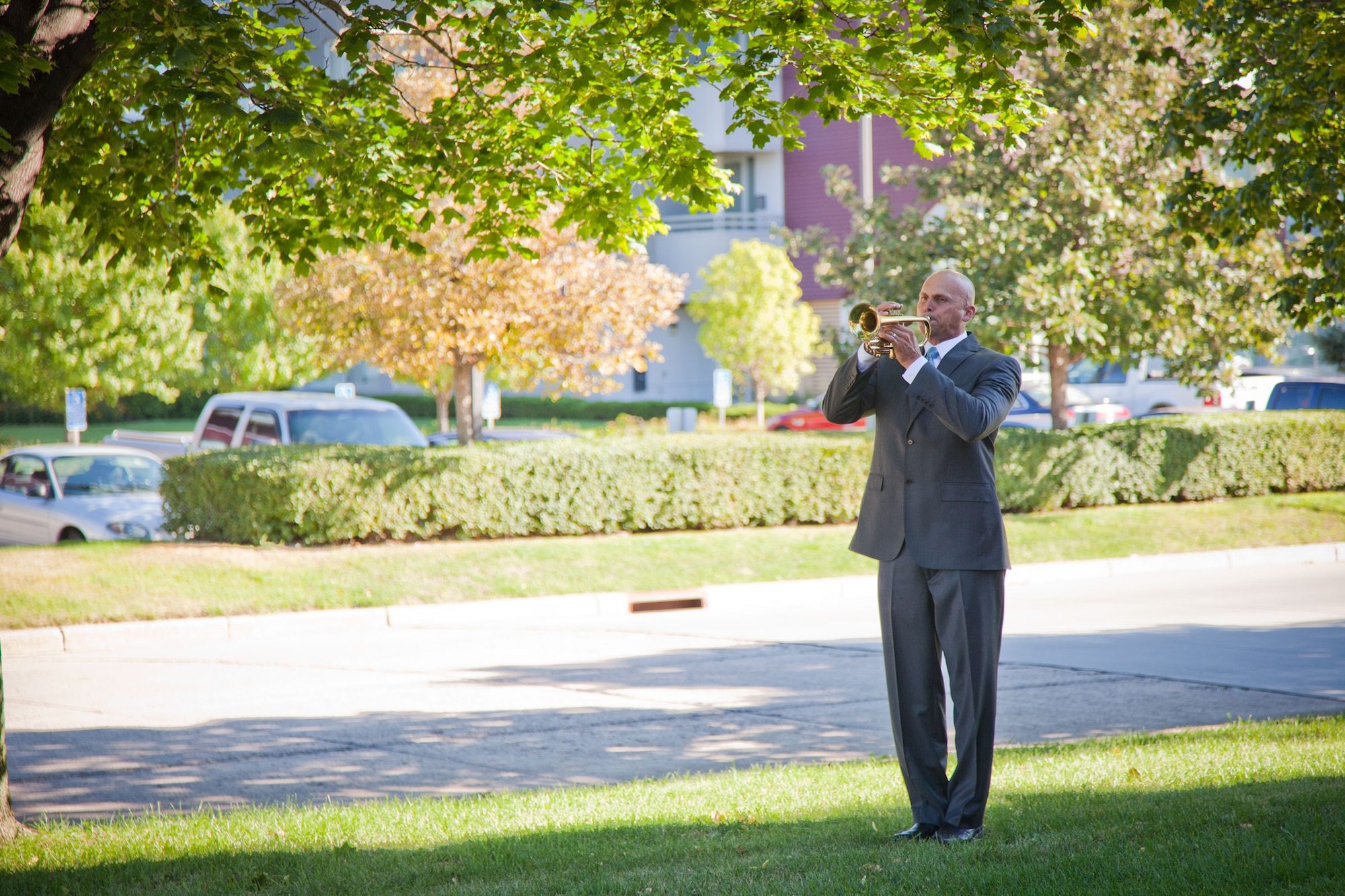Mr. Doug Johnson plays Taps after a Remembrance Ceremony in honor of those lost 9/11.  The 934th Airlift Wing held the ceremony on Sunday over the Unit Training Assembly weekend.  (U.S. Air Force Photo/Shannon McKay)